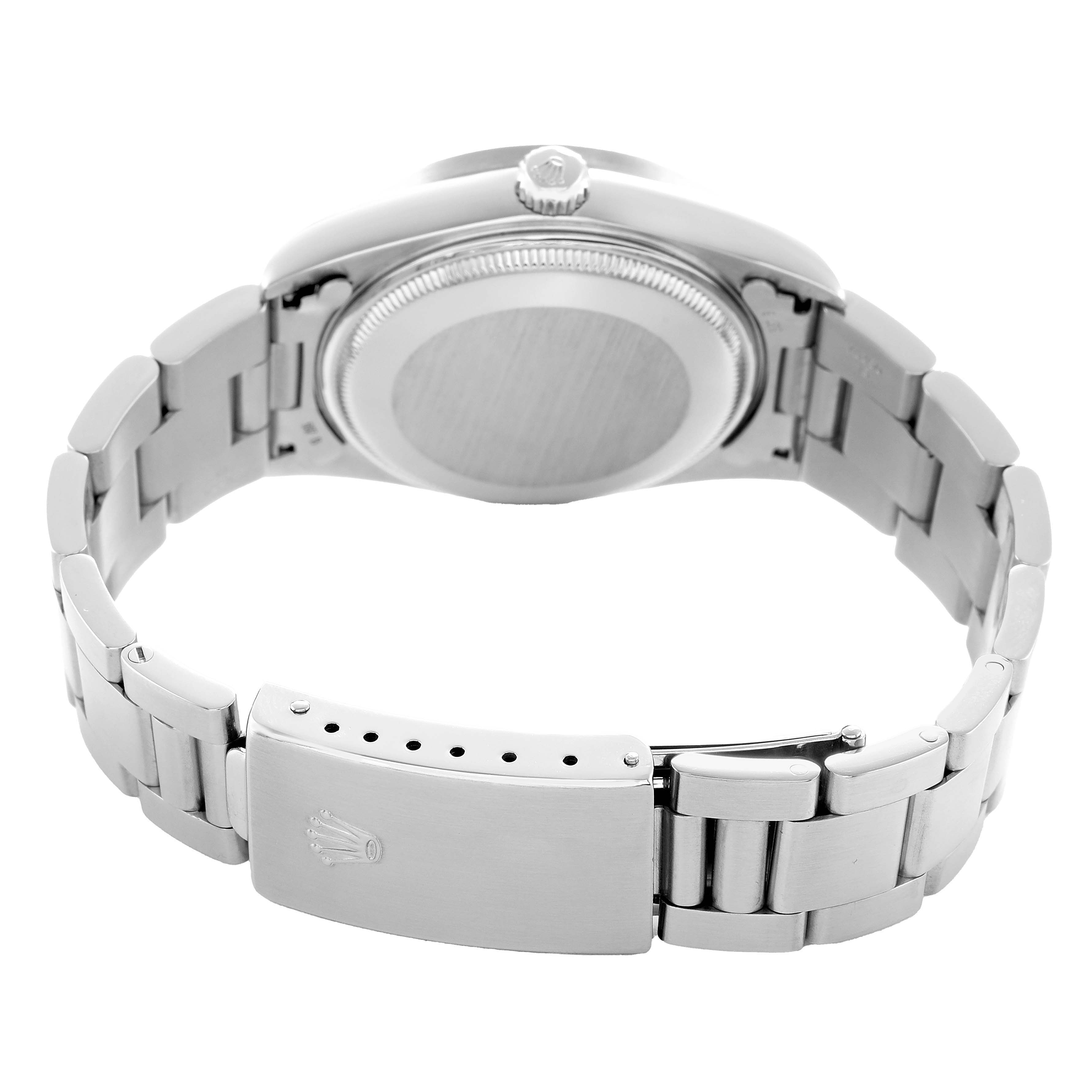 The image shows the back and bracelet of a Rolex Air-King 14010 Men's Stainless Steel White Dial watch, highlighting the clasp and case back from a rear angle.