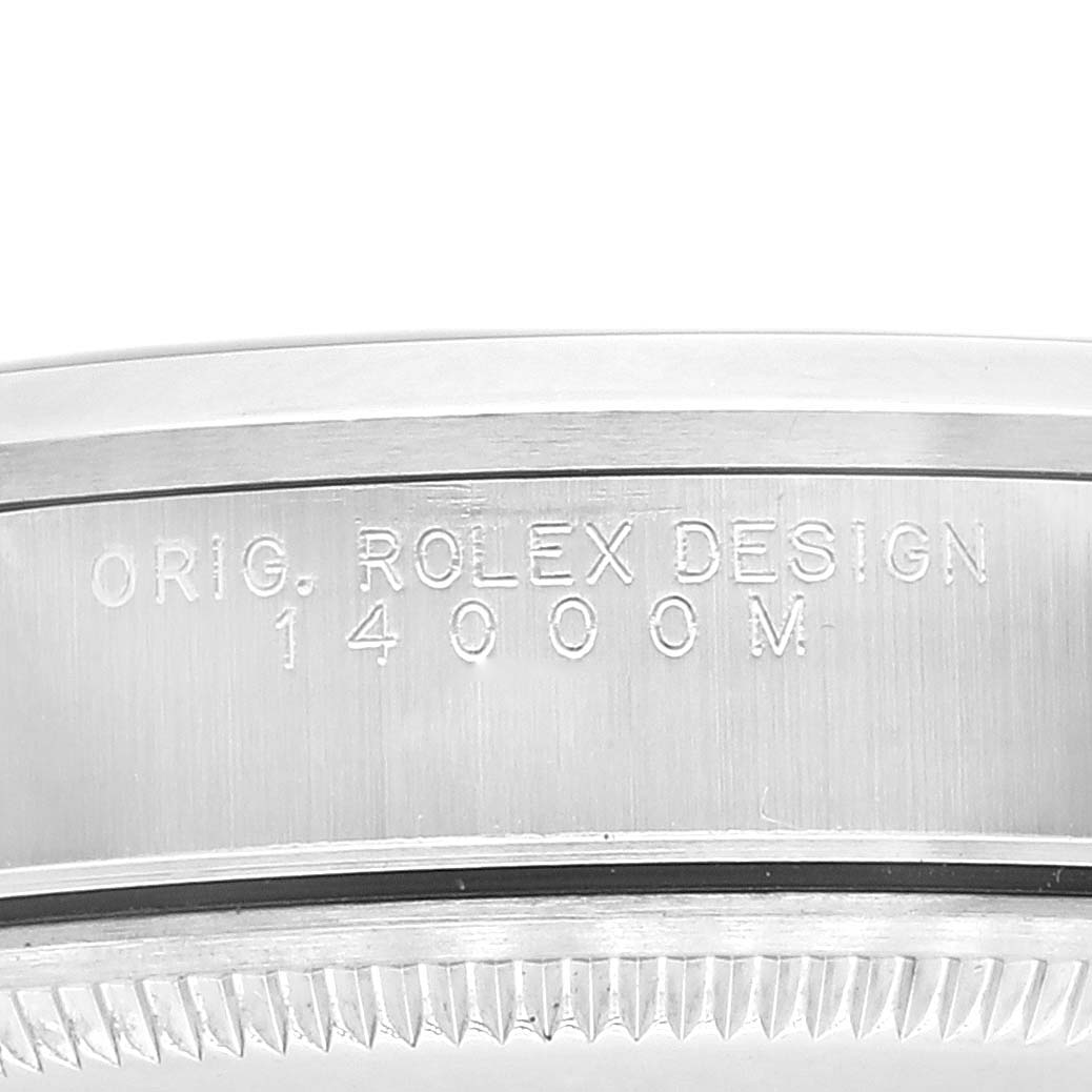 This image shows a close-up of the side engraving on the bezel of a Rolex Air-King 14000M Men's Stainless Steel Black Dial 14000M Men's Stainless Steel Black Dial watch.