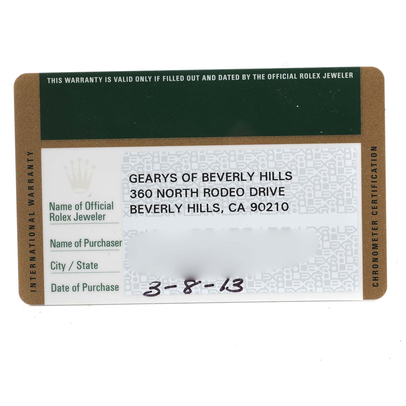 This image shows the warranty card for a Rolex Air-King 114200 Men's Stainless Steel Silver Dial 114200 Men's Stainless Steel Silver Dial watch from an overhead angle.