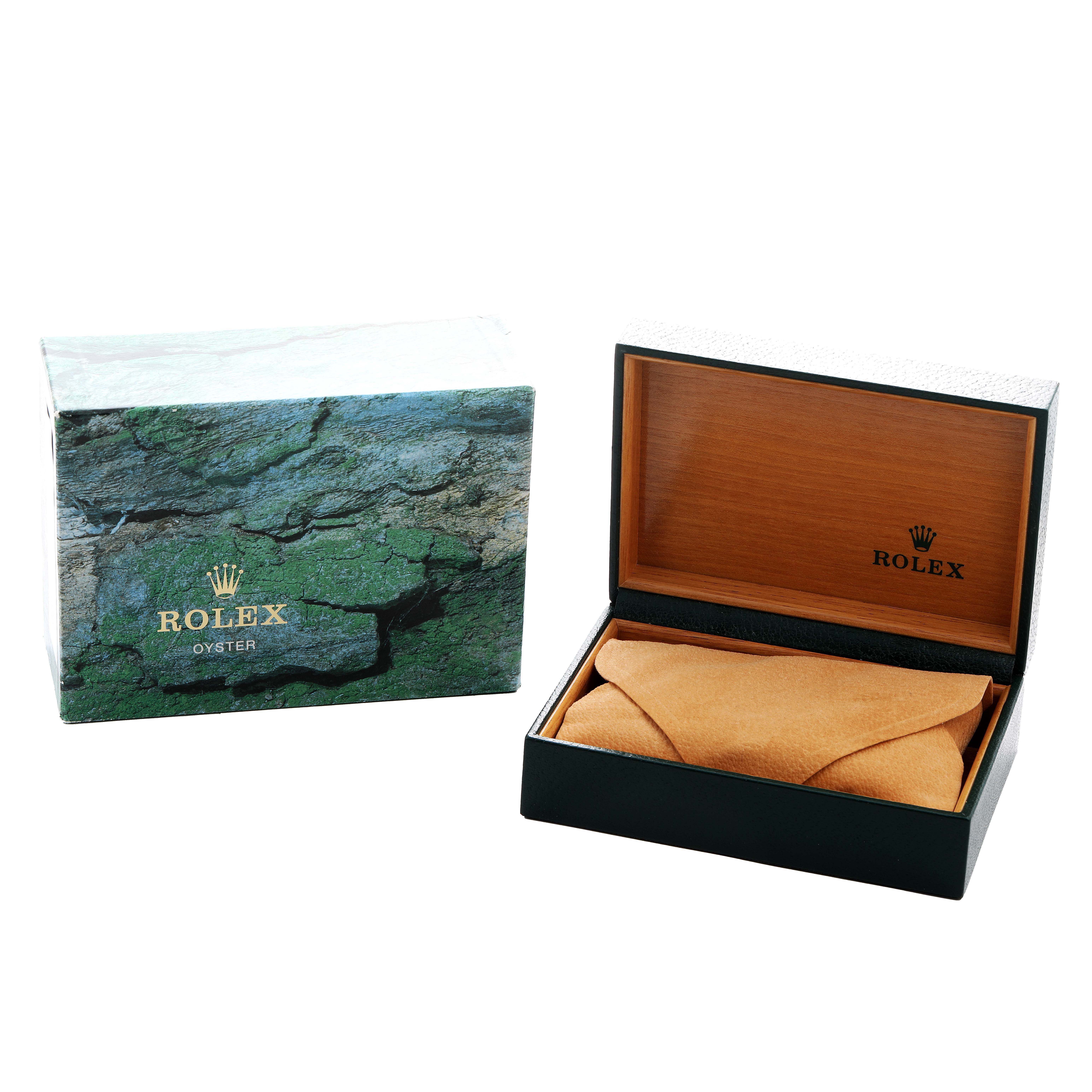 The image shows a Rolex Date 15210 Men's Stainless Steel Black Dial model watch box and a presentation box with a cushion inside, viewed from the front.