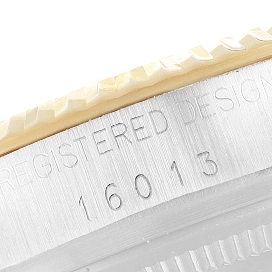 This image shows a close-up angle of the bezel and case side of the Rolex Vintage Collection 16013 Men's Steel and Gold (two tone) Champagne Dial 16013 Men's Steel and Gold (two tone) Champagne Dial model.