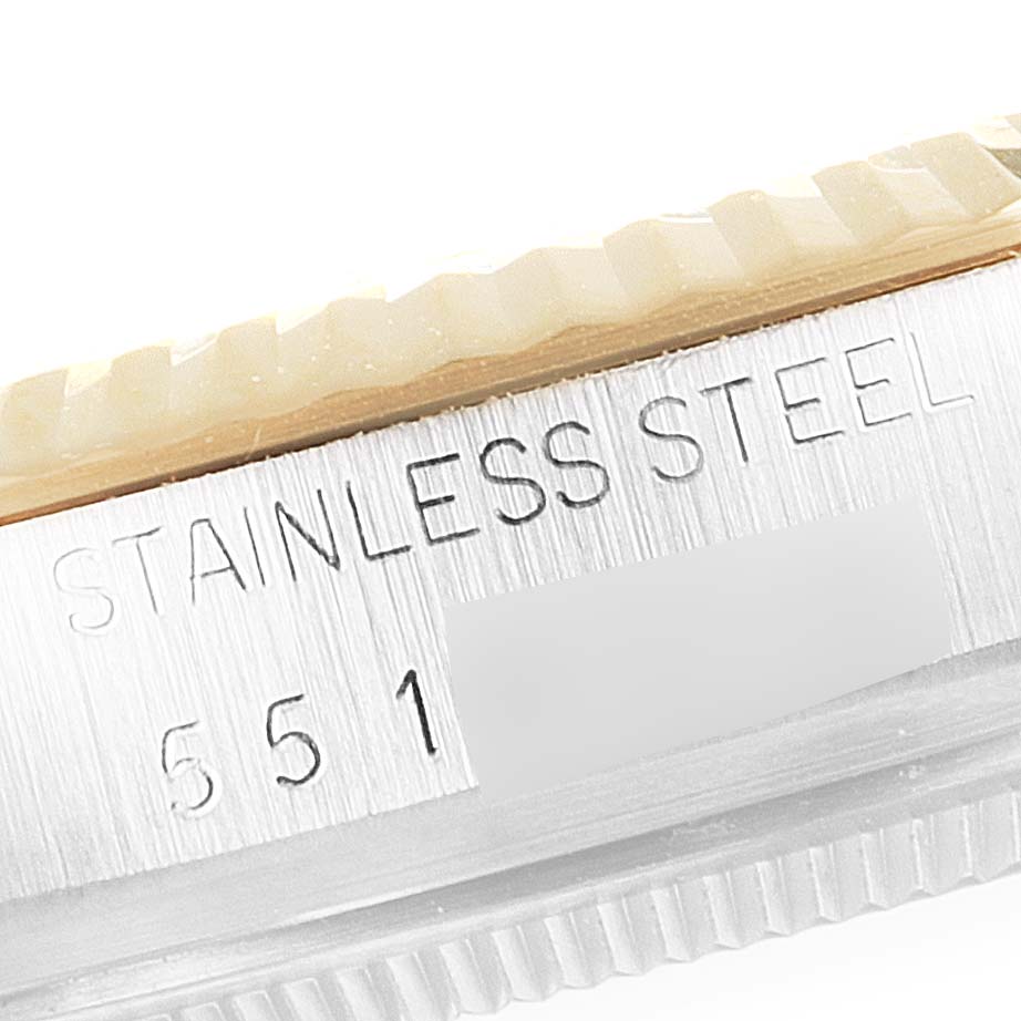 This close-up image shows the side view of the bezel and stainless steel case of the Rolex Vintage Collection 16013 Men's Steel and Gold (two tone) Champagne Dial 16013 Men's Steel and Gold (two tone) Champagne Dial watch.