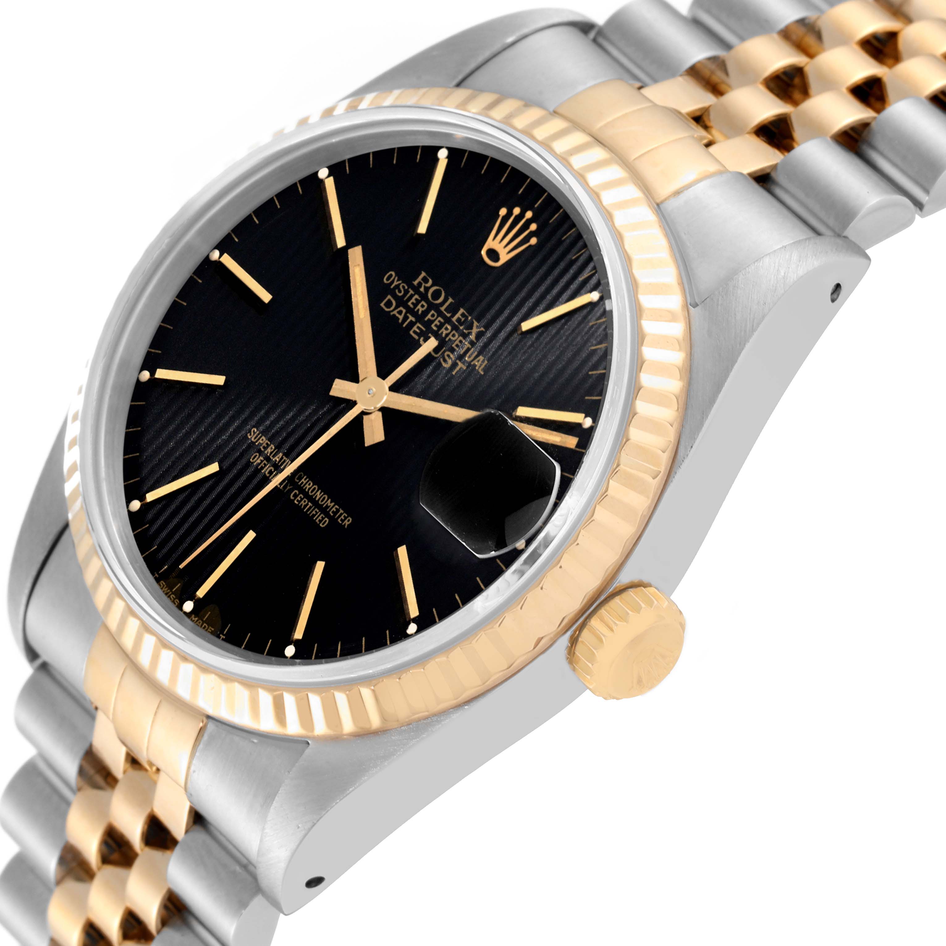 The image shows a close-up side angle of the Rolex Datejust 16233 Men's Steel and Gold (two tone) Black Dial 16233 Men's Steel and Gold (two tone) Black Dial watch, highlighting its dial, bezel, crown, and part of the bracelet.