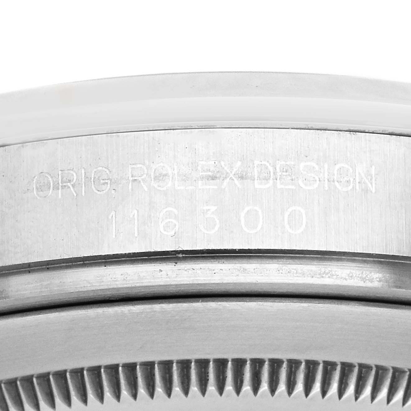 The image shows the side view of a Rolex Datejust 41 116300 Men's Stainless Steel Black Dial, focusing on the engraved case and bezel.