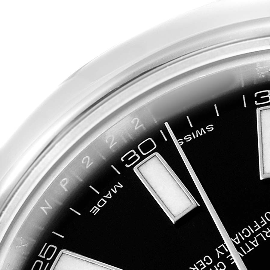 This close-up of the Rolex Datejust 41 116300 Men's Stainless Steel Black Dial shows the edge of the dial with part of the bezel, hour markers, and minute indices.