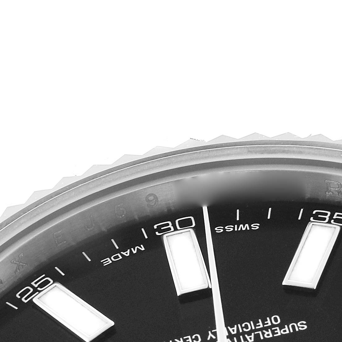 The image shows a partial close-up of the Rolex Datejust 41 116334 Men's Stainless Steel Black Dial's dial and bezel, focusing on hour markers and minute indices.