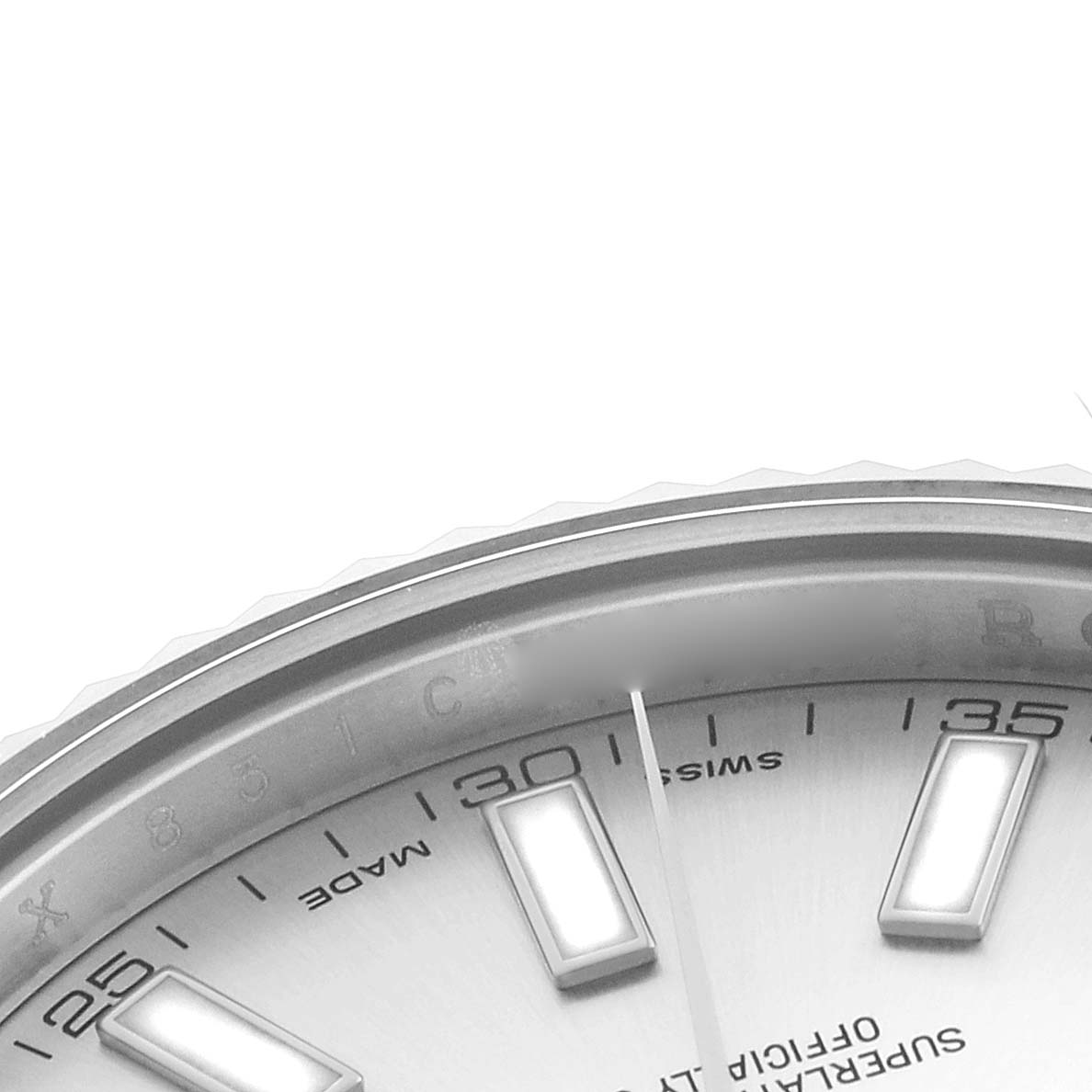 The image shows a close-up of the dial edge and hour markers on a Rolex Datejust 41 116334 Men's Stainless Steel Silver Dial.