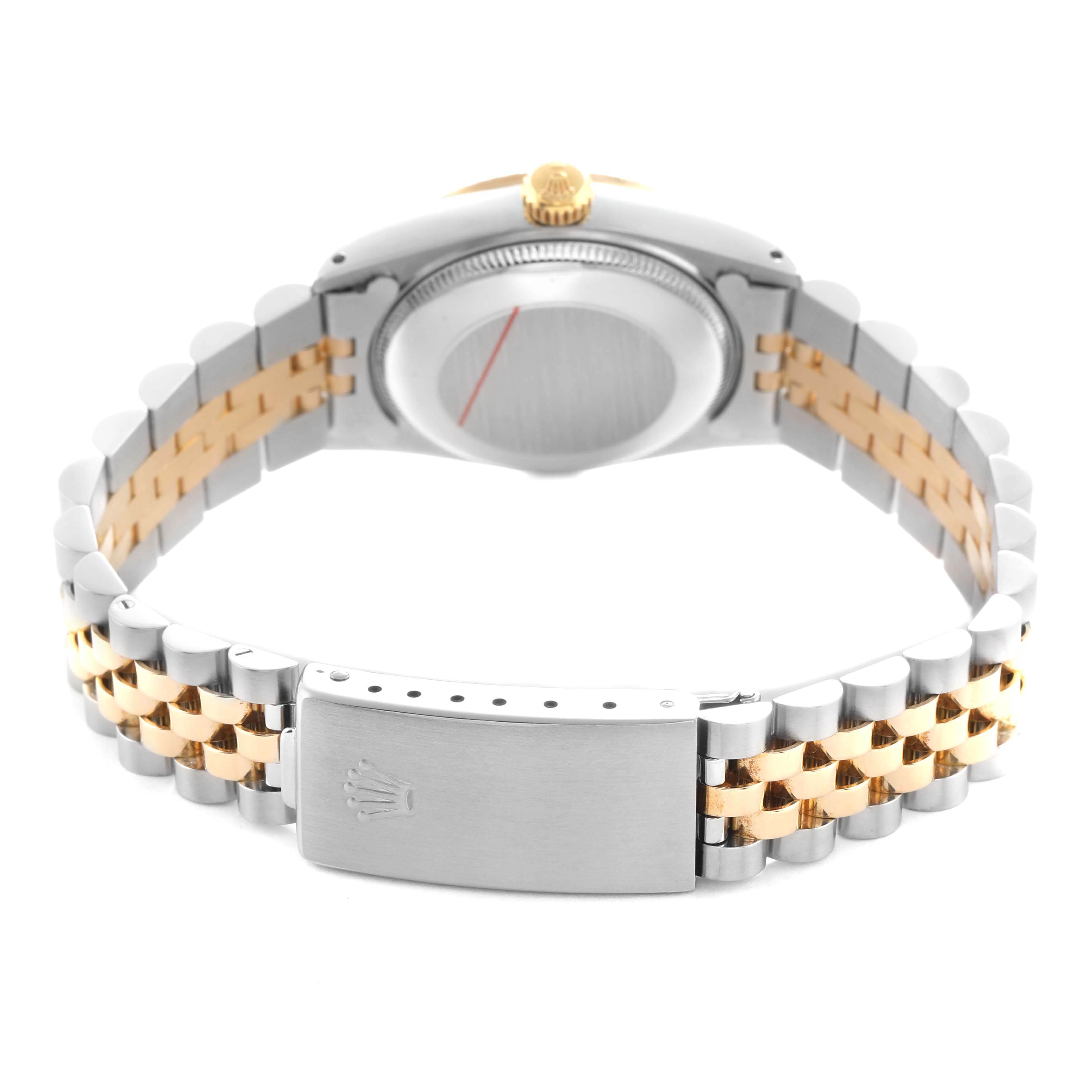 This Rolex Mid-Size 68273 Women's Steel and Gold (two tone) Champagne Dial watch is shown from the back, highlighting the bracelet, clasp, and caseback.