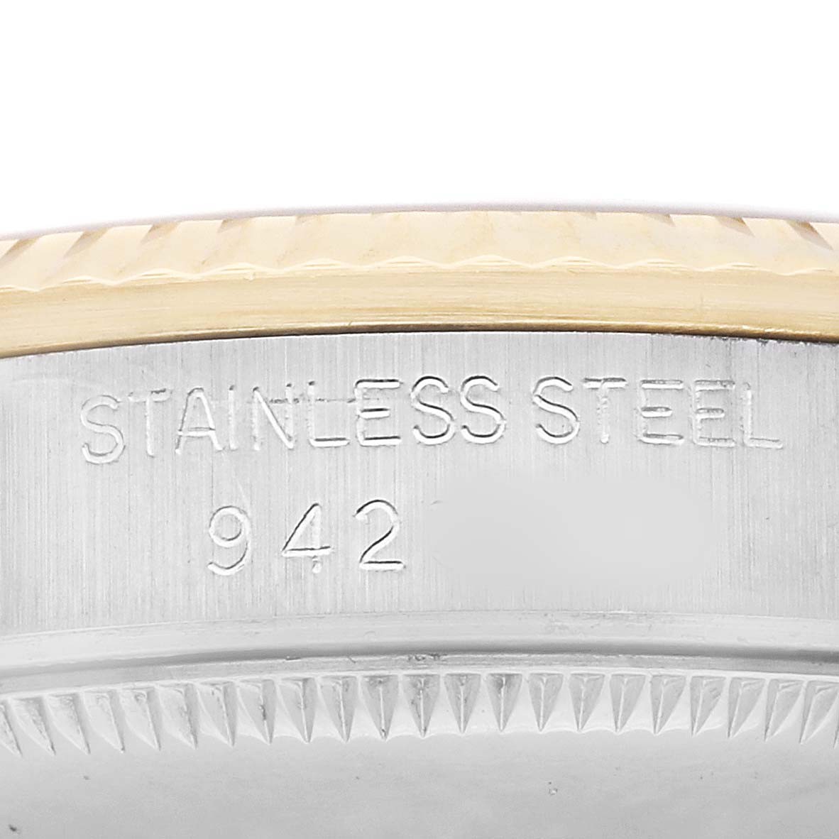 The image shows the side view of a Rolex Mid-Size 68273 Women's Steel and Gold (two tone) Champagne Dial model, highlighting the stainless steel case and bezel detail.