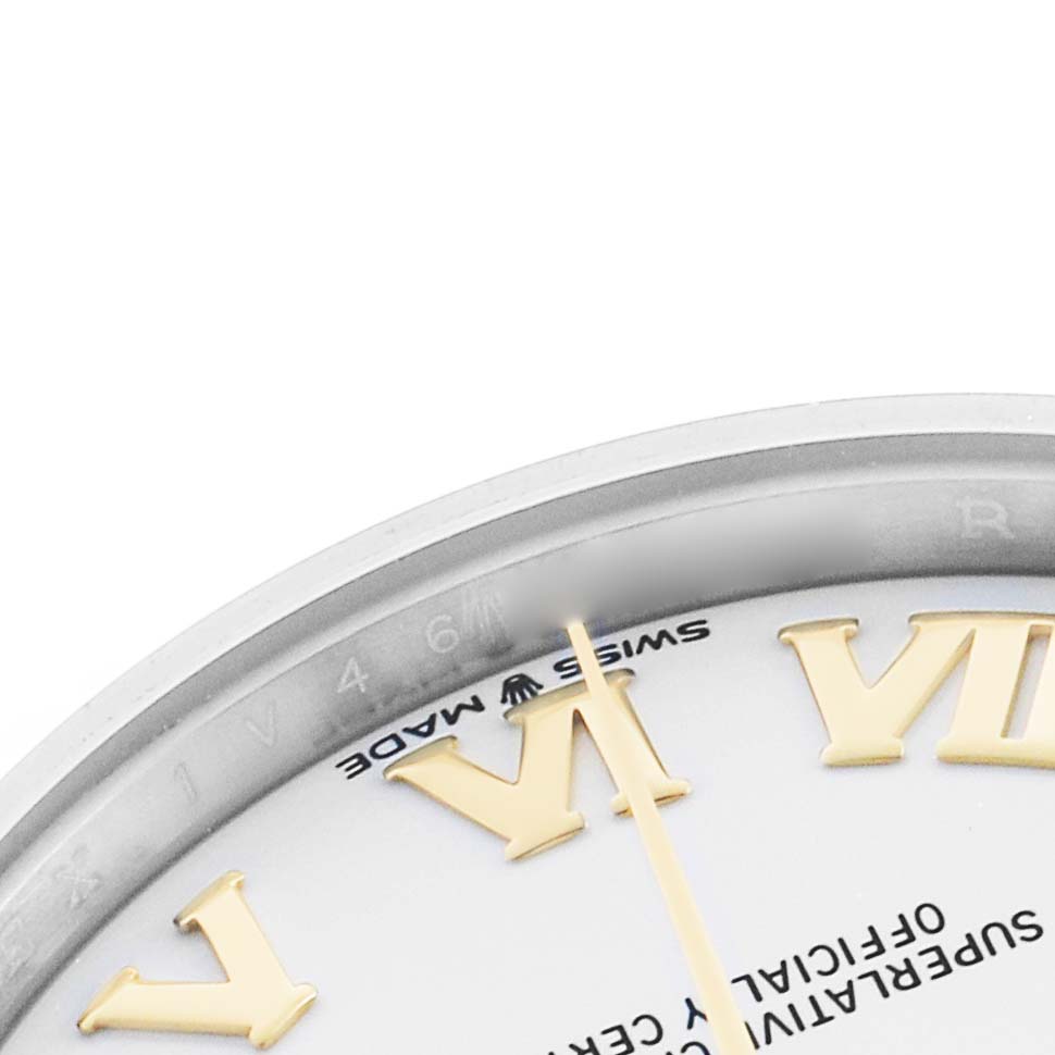 The image shows a partial view of a Rolex Mid-Size 278273 Women's Steel and Gold (two tone) White Dial watch dial with Roman numerals, focusing on the "Swiss Made" text at the bottom.