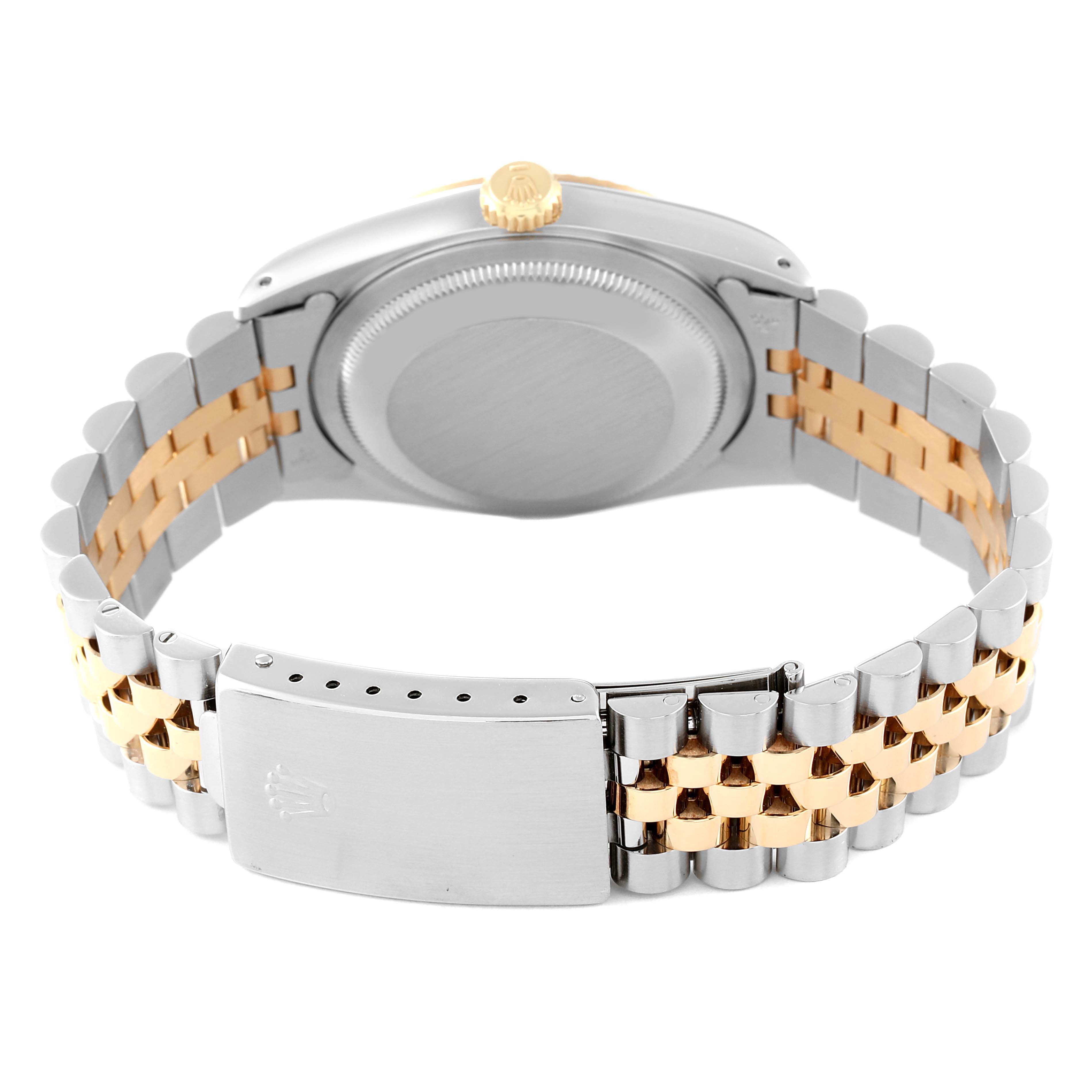 This image shows the back view of a Rolex Datejust 16233 Men's Steel and Gold (two tone) Champagne Dial 16233 Men's Steel and Gold (two tone) Champagne Dial watch, highlighting the case back, crown, and two-tone bracelet with clasp.