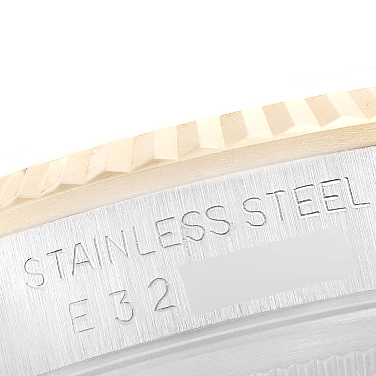 The image shows a close-up of the bezel and the side engraving on a Rolex Datejust 16233 Men's Steel and Gold (two tone) Champagne Dial 16233 Men's Steel and Gold (two tone) Champagne Dial watch.