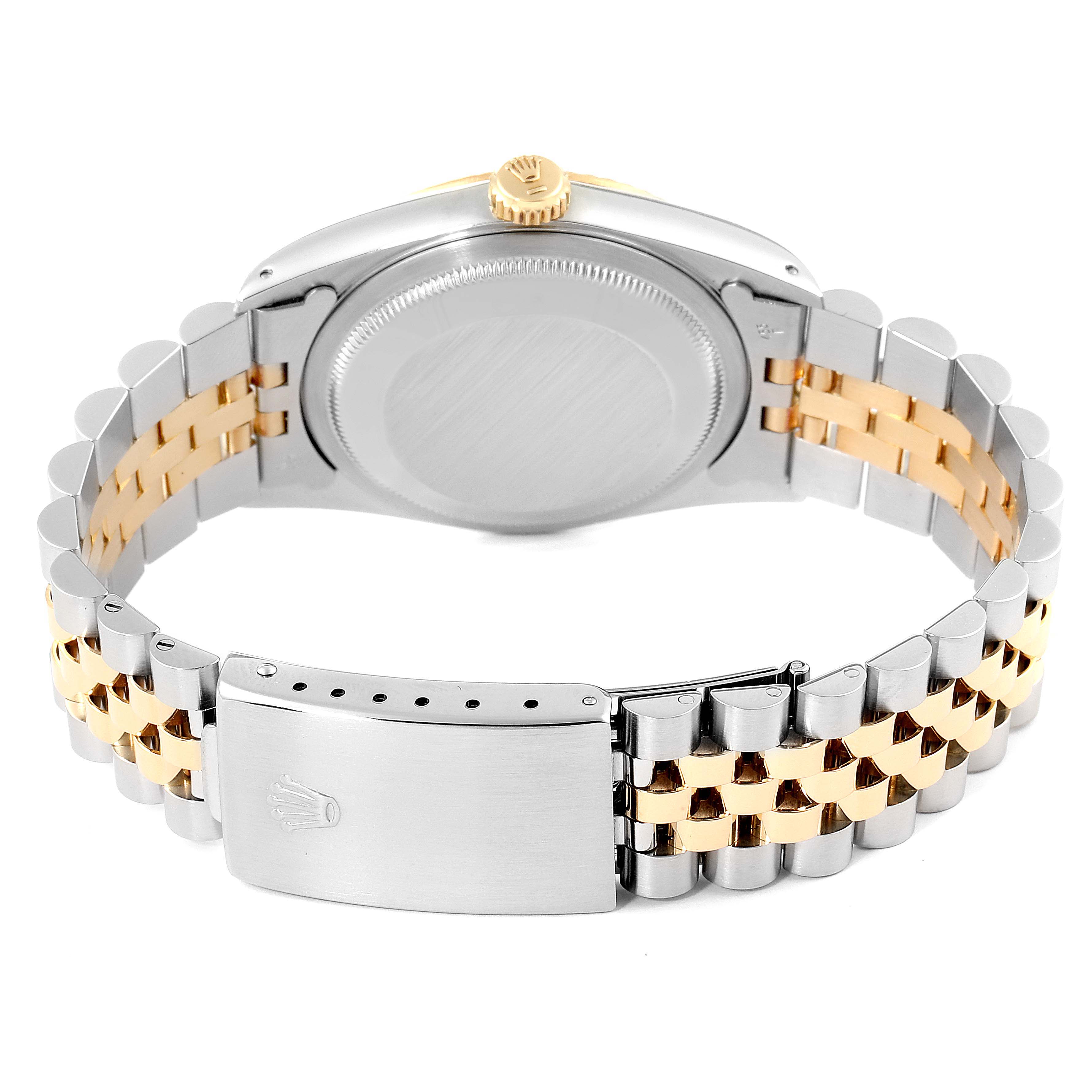 This image shows the back view of a Rolex Datejust 16233 Men's Steel and Gold (two tone) Champagne Dial 16233 Men's Steel and Gold (two tone) Champagne Dial watch, highlighting the case back and the jubilee bracelet with a clasp.