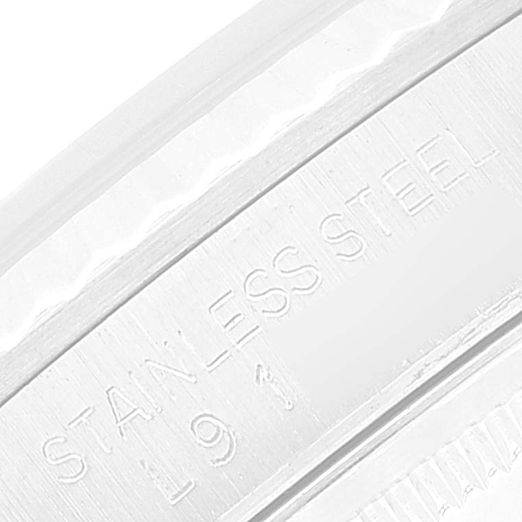 This close-up image shows the stainless steel engraving on the bezel of the Rolex Datejust 16234 Men's Stainless Steel Pink Dial 16234 Men's Stainless Steel Pink Dial watch.