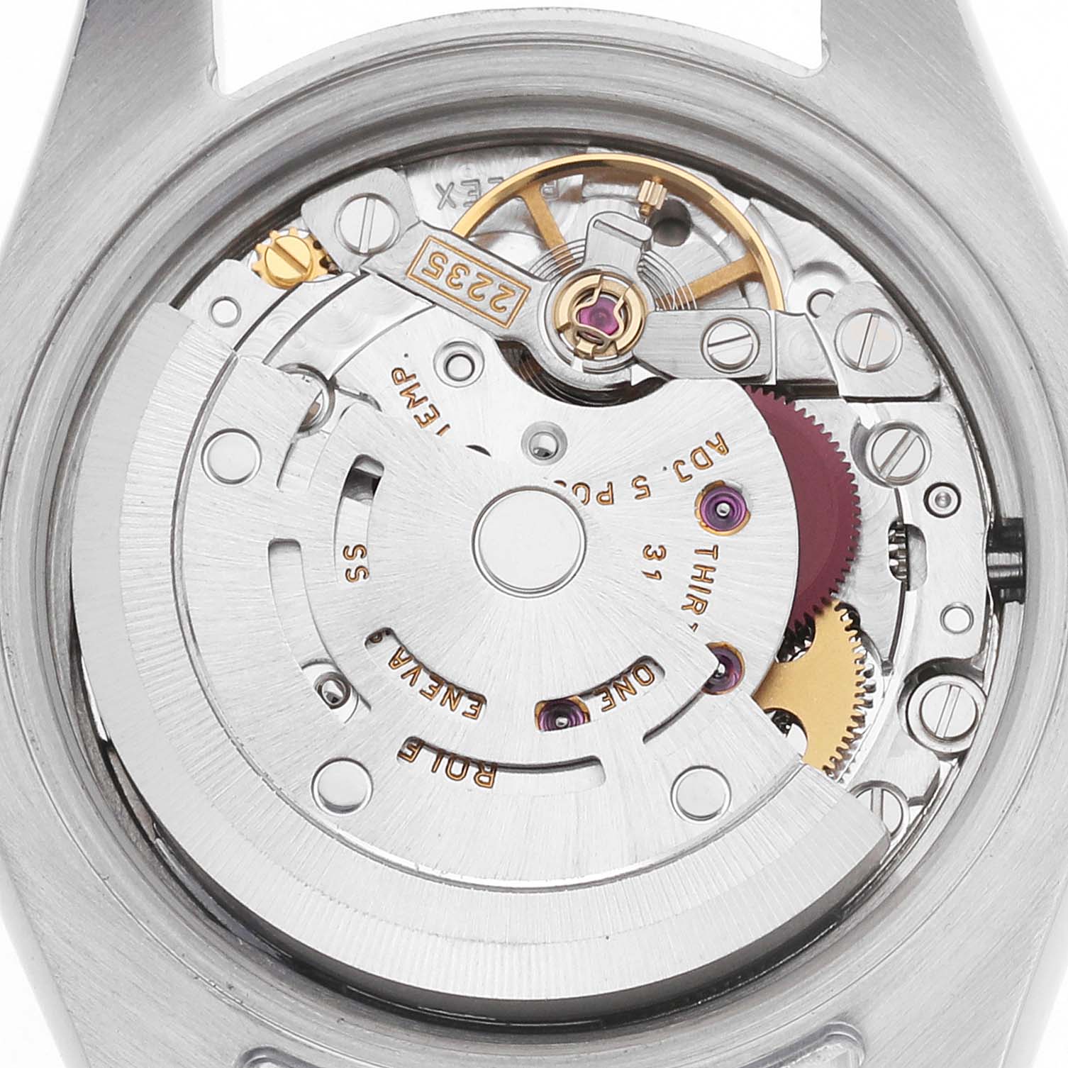 The image shows the movement of a Rolex Datejust 179174 Women's Stainless Steel Silver Dial watch from a top-down angle, highlighting its intricate mechanical components.