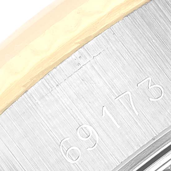 The image shows a close-up angle of the model number 69173 on the casing of a Rolex Datejust 69173 Women's Steel and Gold (two tone) Champagne Dial 69173 Women's Steel and Gold (two tone) Champagne Dial watch.