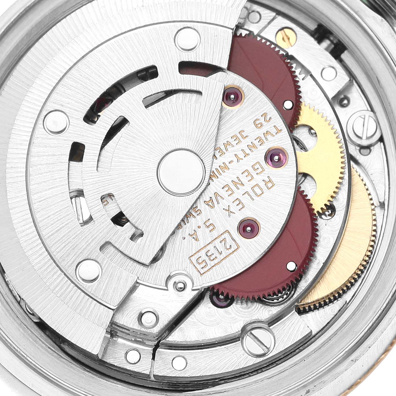 The image shows a close-up of the Rolex Datejust 69173 Women's Steel and Gold (two tone) Champagne Dial 69173 Women's Steel and Gold (two tone) Champagne Dial watch's movement and internal mechanism, highlighting the gears and rotor.