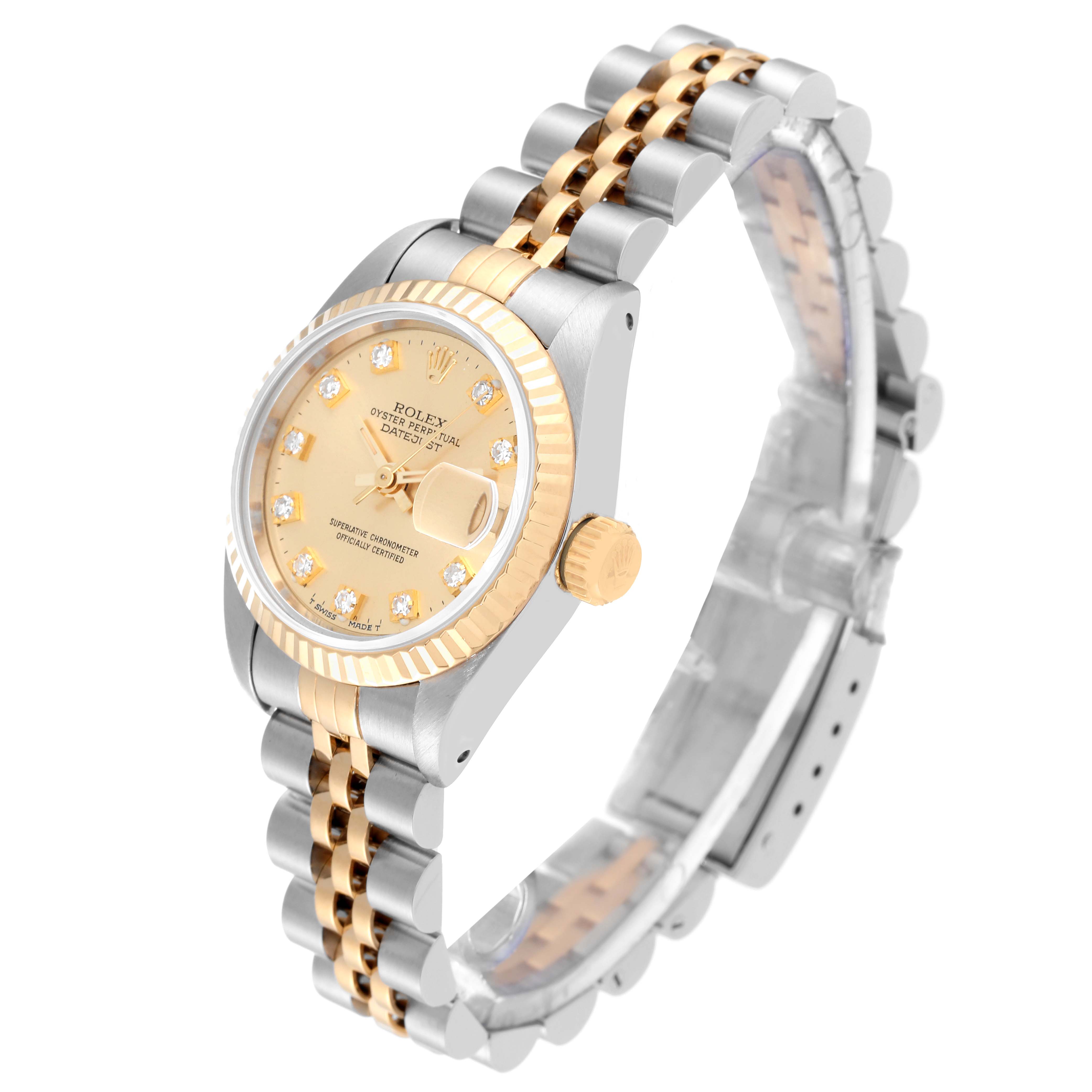 This image displays a Rolex Datejust 69173 Women's Steel and Gold (two tone) Champagne Dial 69173 Women's Steel and Gold (two tone) Champagne Dial watch at a three-quarter angle, showcasing the face, bezel, crown, and the two-tone bracelet.