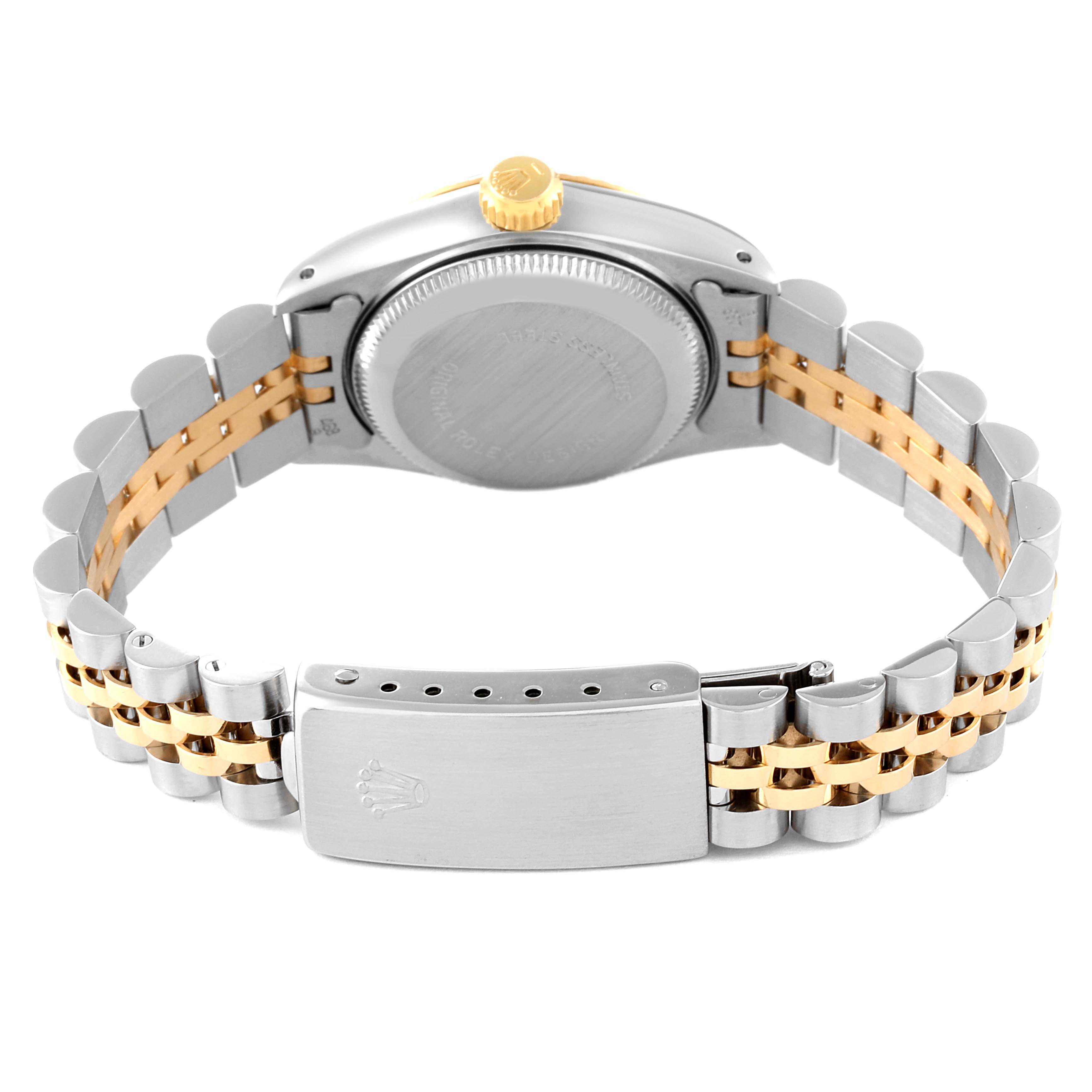 The image shows the back case and clasp of a Rolex Datejust 69173 Women's Steel and Gold (two tone) Champagne Dial 69173 Women's Steel and Gold (two tone) Champagne Dial watch, featuring a two-tone metal bracelet.