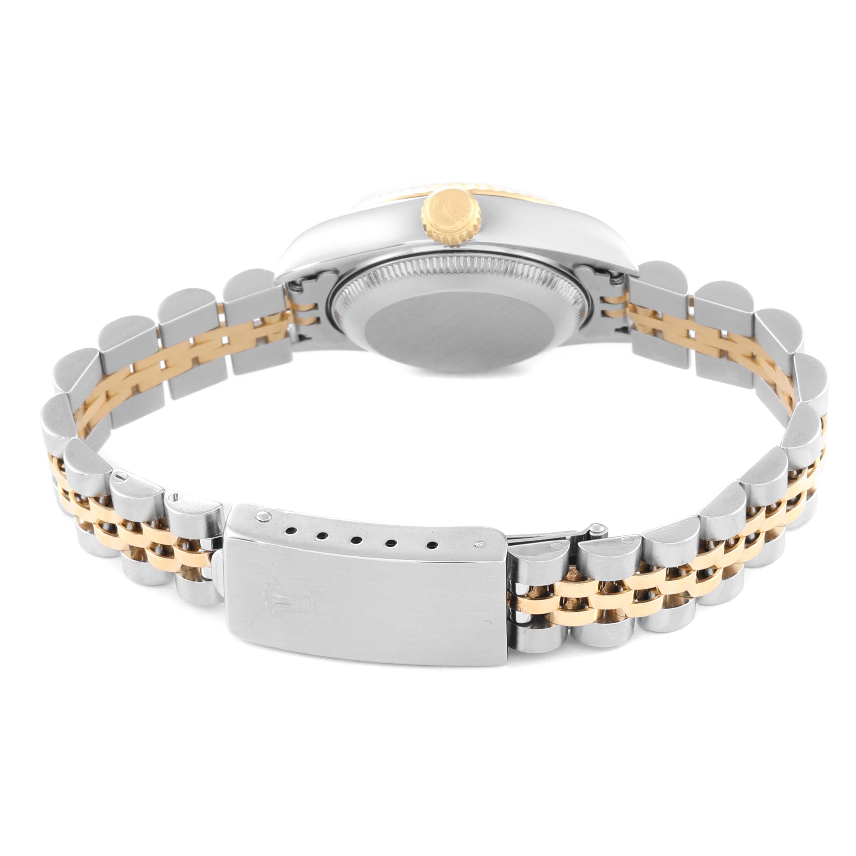 The image shows the back view of a Rolex Datejust 69173 Women's Steel and Gold (two tone) Silver Dial 69173 Women's Steel and Gold (two tone) Silver Dial watch, highlighting its clasp, bracelet, case back, and crown.