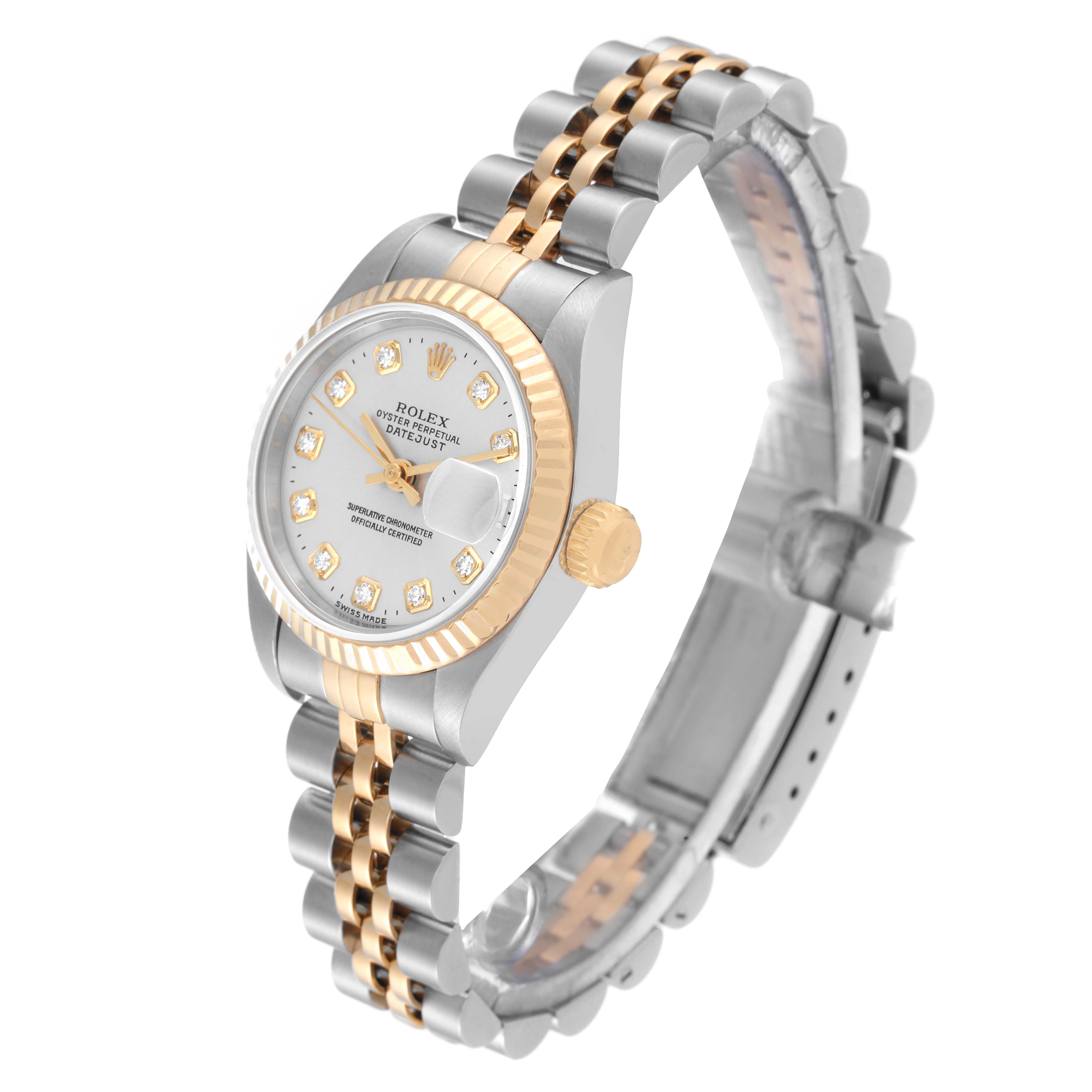 The Rolex Datejust 69173 Women's Steel and Gold (two tone) Silver Dial 69173 Women's Steel and Gold (two tone) Silver Dial watch is shown at a slight side angle, displaying its two-tone bracelet, dial with diamond markers, and fluted bezel.