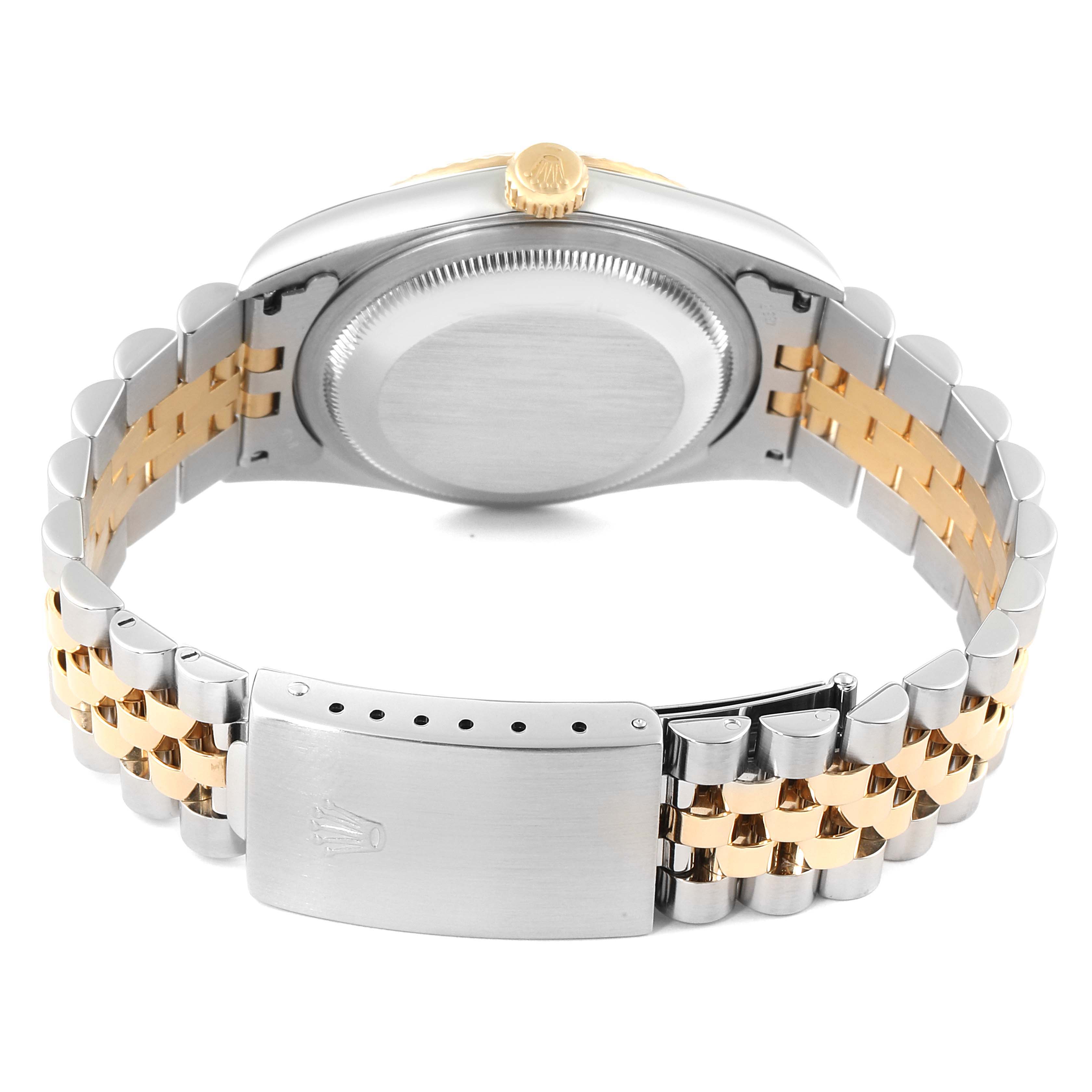 The image shows the back view of a Rolex Datejust 16233 Men's Steel and Gold (two tone) White Dial 16233 Men's Steel and Gold (two tone) White Dial watch, highlighting its case, crown, and two-tone bracelet with clasp.