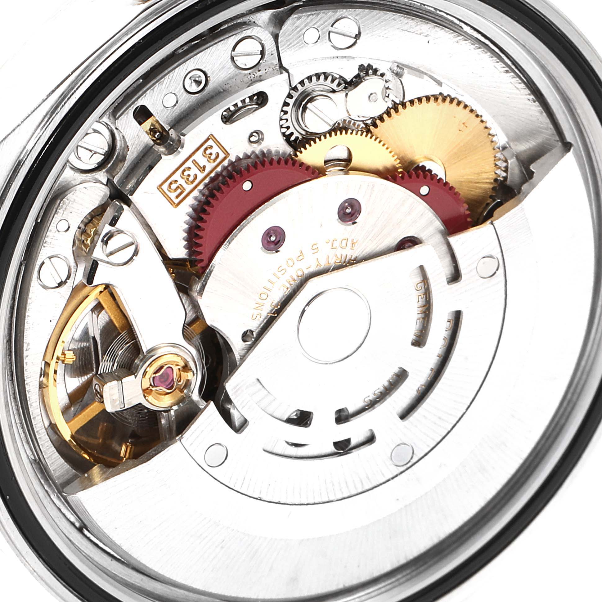 This image shows the inner mechanical movement of a Rolex Datejust 16233 Men's Steel and Gold (two tone) White Dial 16233 Men's Steel and Gold (two tone) White Dial watch from a close-up, rear angle.