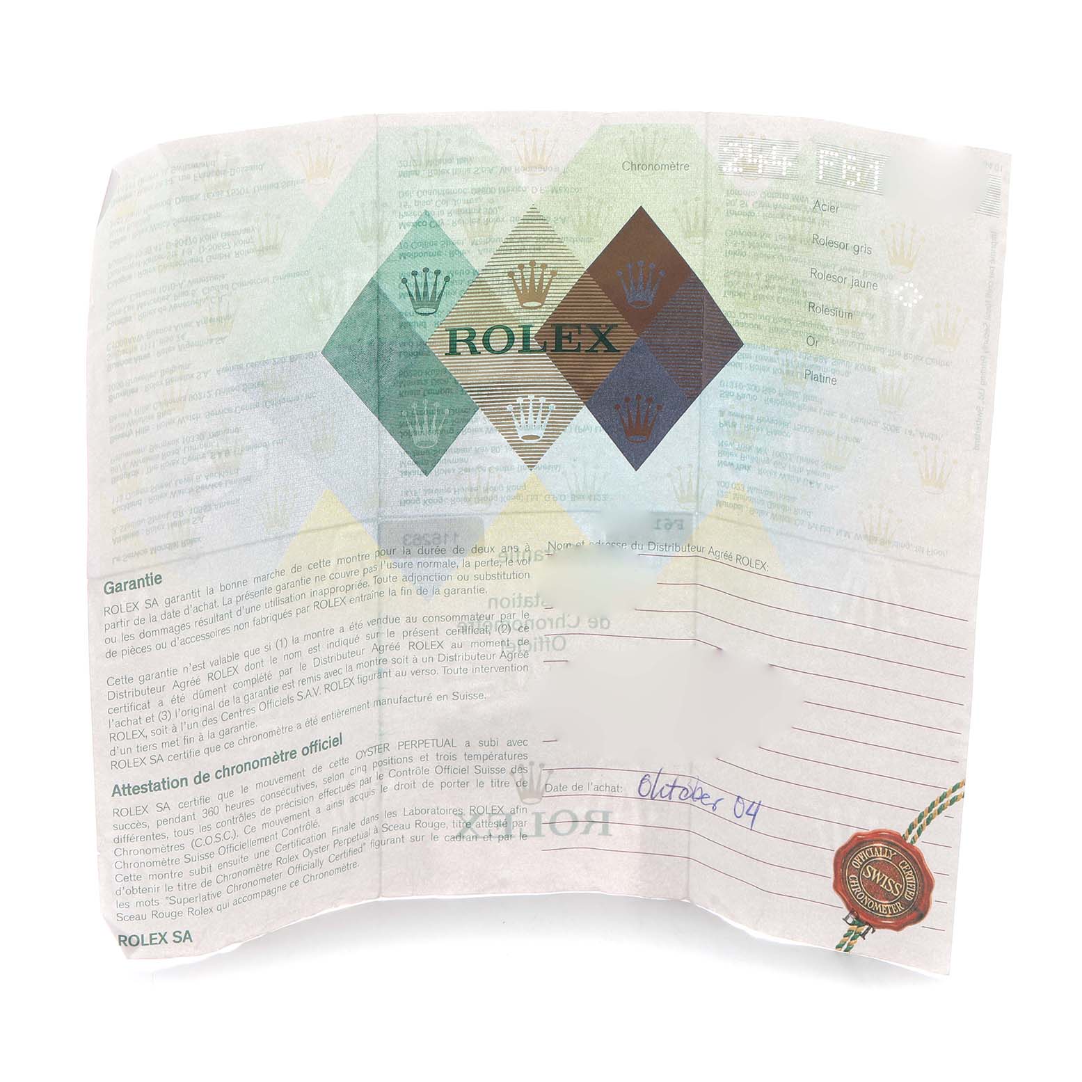 This image shows a warranty paper for a Turn-o-Graph model by Rolex, displaying branding and text details.