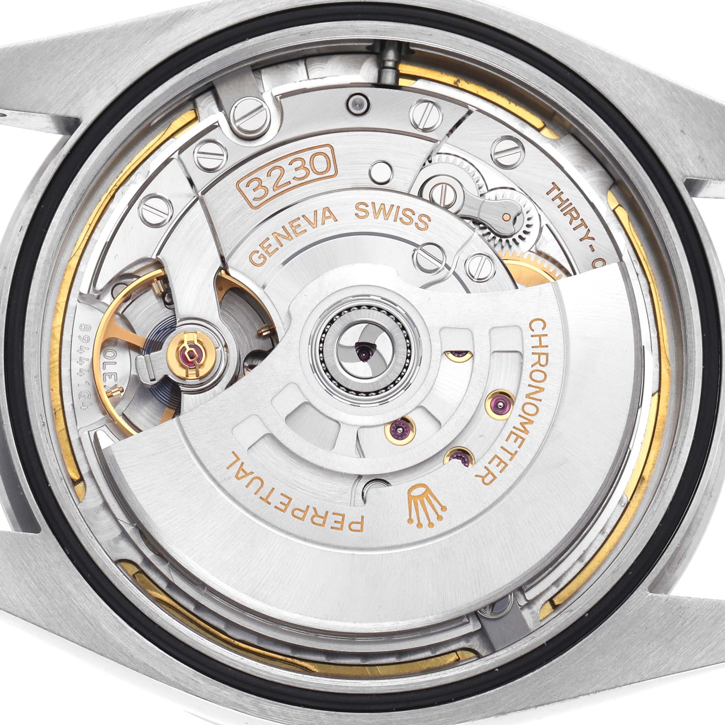 The image shows the internal mechanism of a Rolex Explorer 224270 Men's Stainless Steel Black Dial watch from a back angle, highlighting the movement parts.
