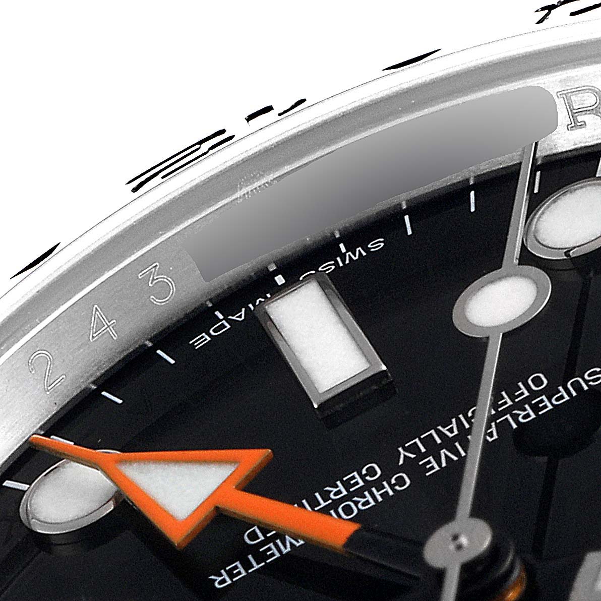 This close-up image shows part of the dial, hands, and bezel of a Rolex Explorer 216570 Men
s Stainless Steel Black Dial 216570 Men
s Stainless Steel Black Dial watch.