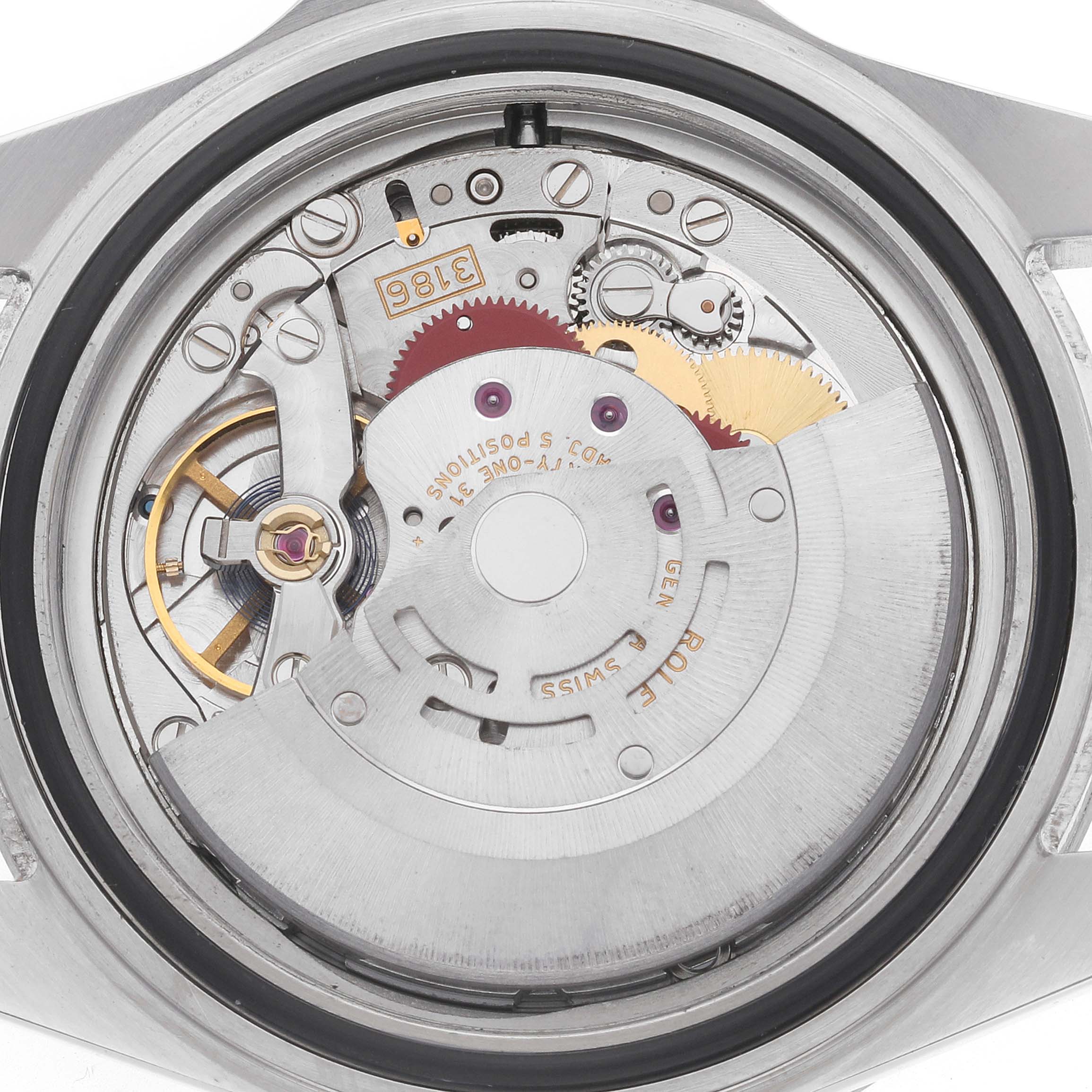 The image shows the internal movement of a Rolex Explorer 16570 Men's Stainless Steel White Dial watch from a back view, highlighting gears and the rotor.