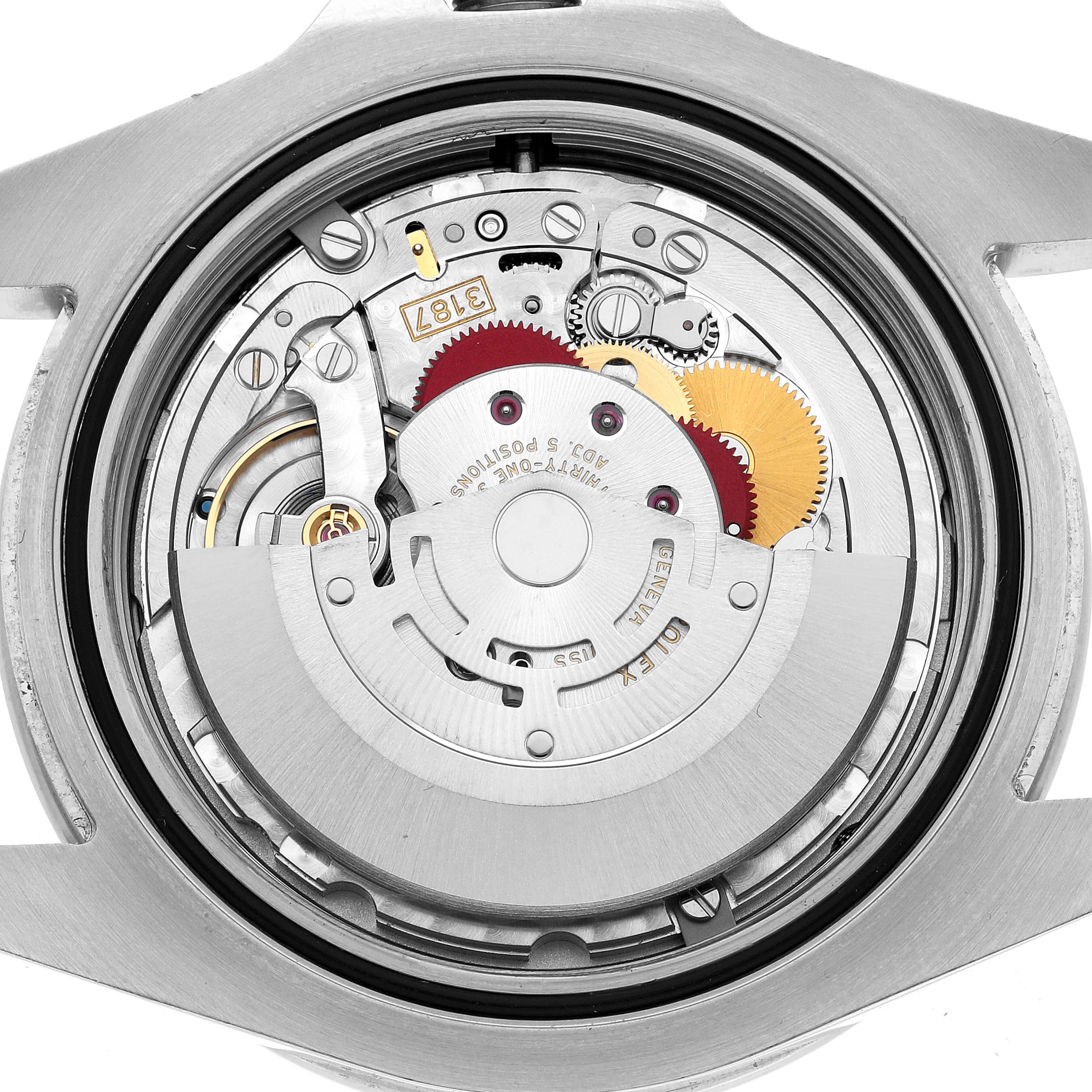 The image shows the internal mechanism of a Rolex Explorer 216570 Men's Stainless Steel White Dial watch from a top view, highlighting the movement components.