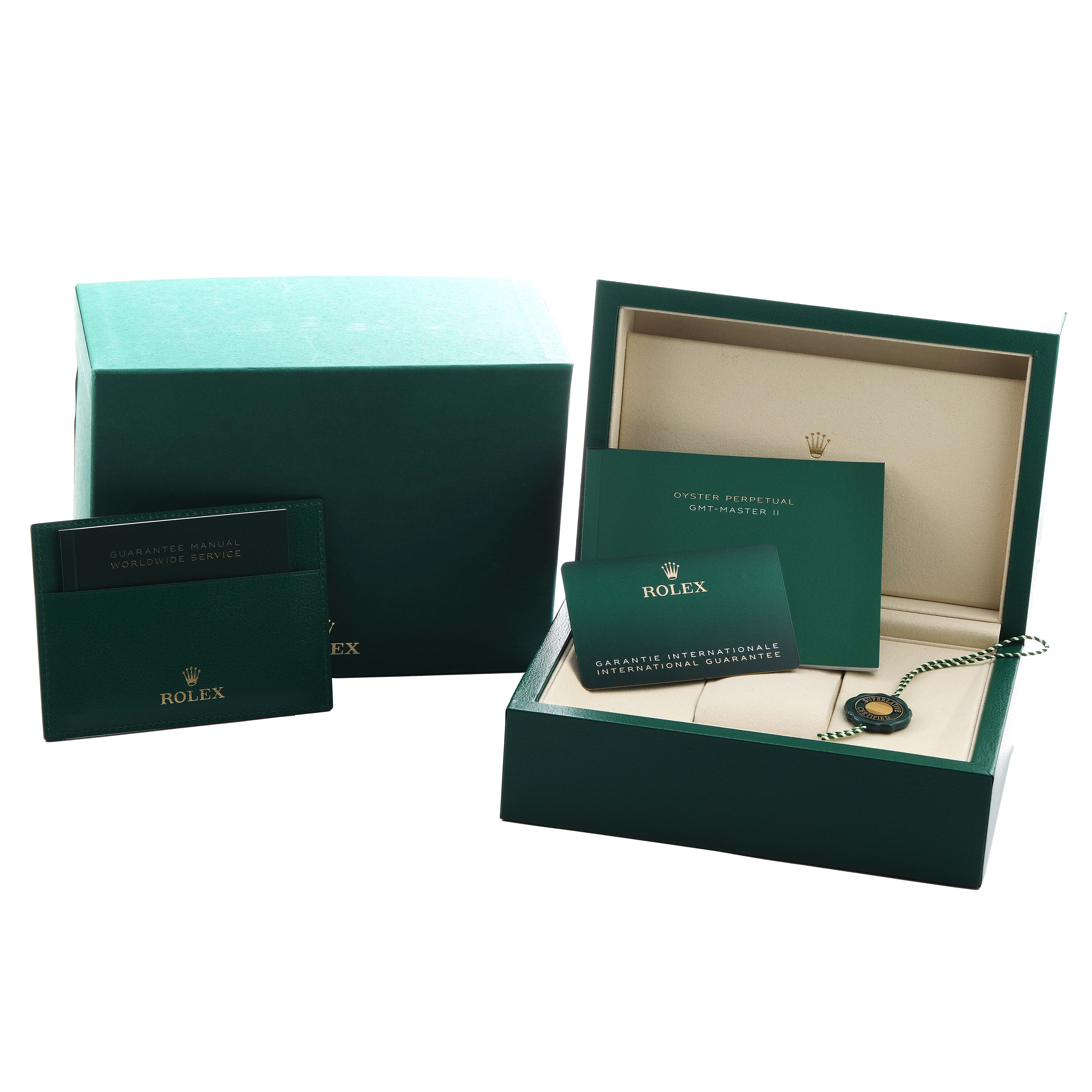 The image shows the packaging and documentation for a Rolex GMT-Master 126710 Men's Stainless Steel Black Dial, including the box, manuals, and warranty card.