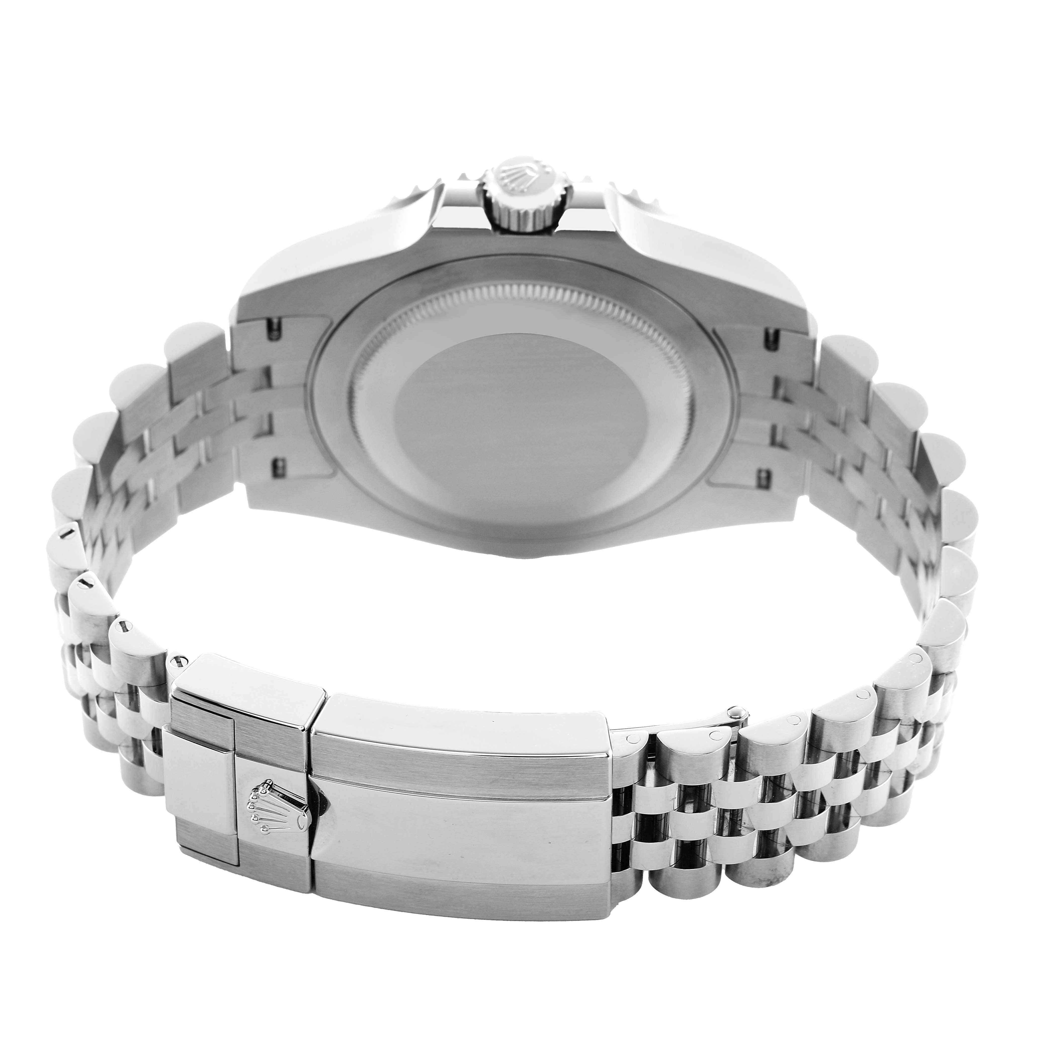 The Rolex GMT-Master 126710 Men's Stainless Steel Black Dial watch is shown from the back angle, highlighting the case back, crown, and bracelet with the clasp visible.