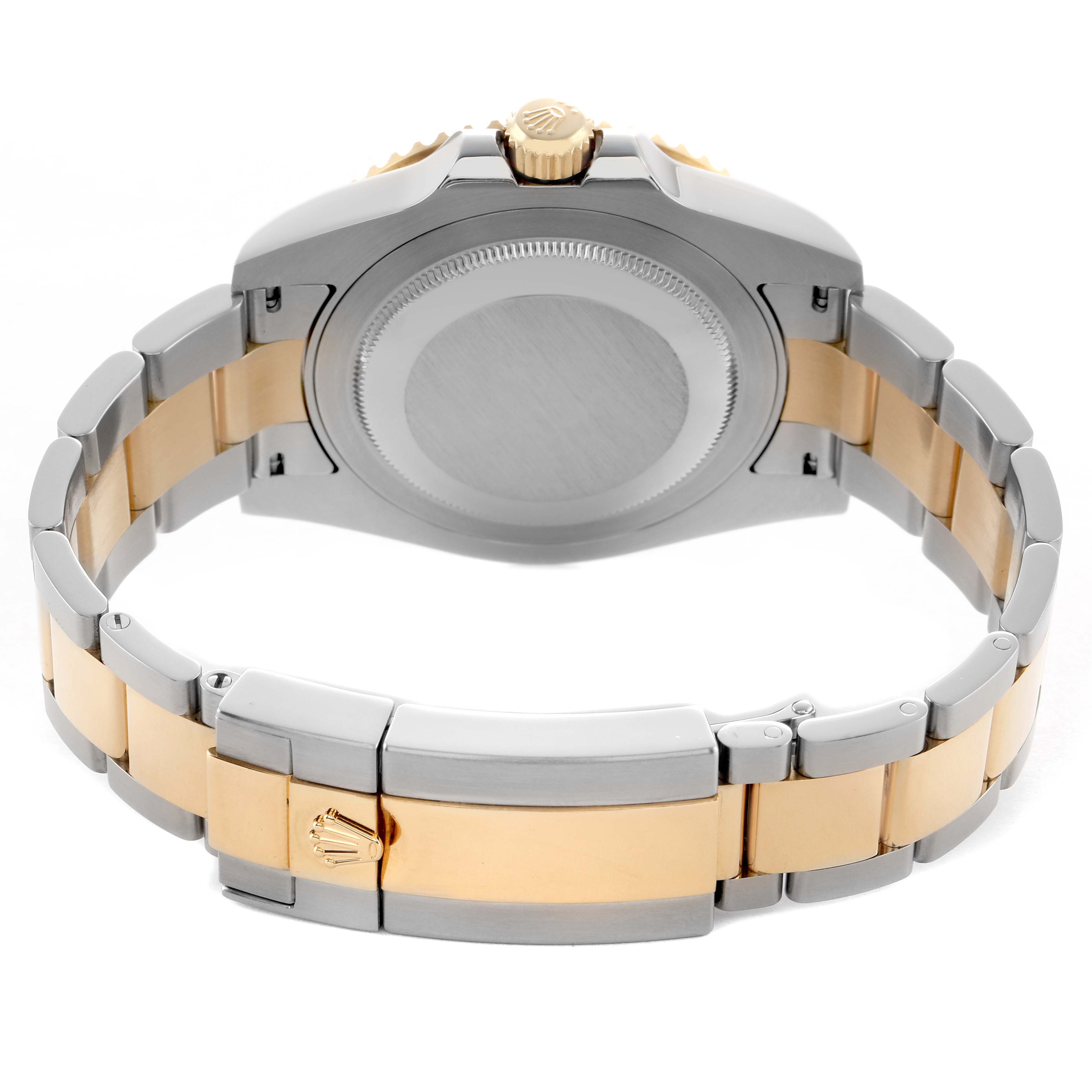 The image shows the back case, crown, and bracelet of a Rolex GMT-Master 116713 Men's Steel and Gold (two tone) Black Dial, highlighting its two-tone design.