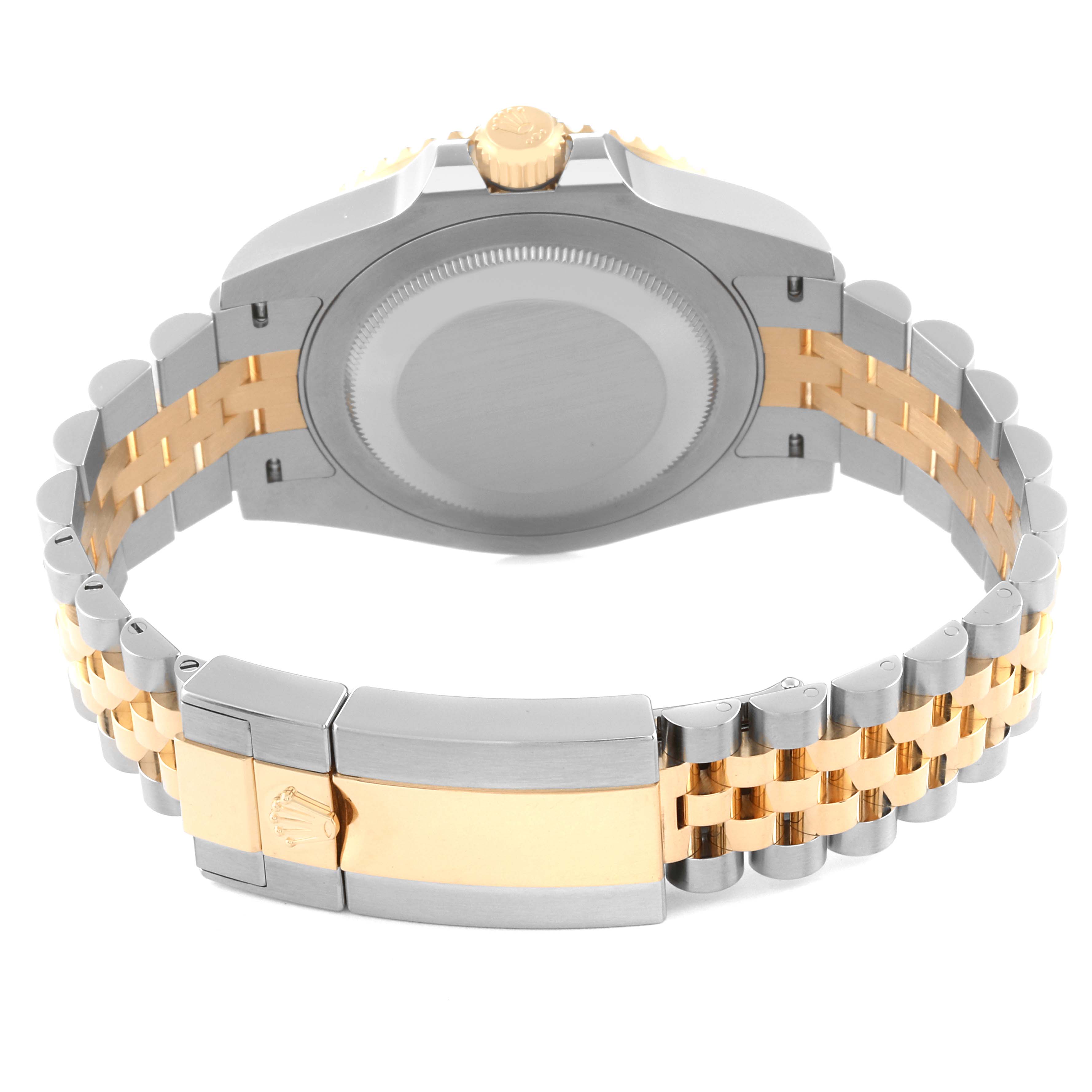 This image shows the back case and the bracelet of a Rolex GMT-Master 126713 Men's Steel and Gold (two tone) Black Dial 126713 Men's Steel and Gold (two tone) Black Dial watch, featuring a two-tone metal design.