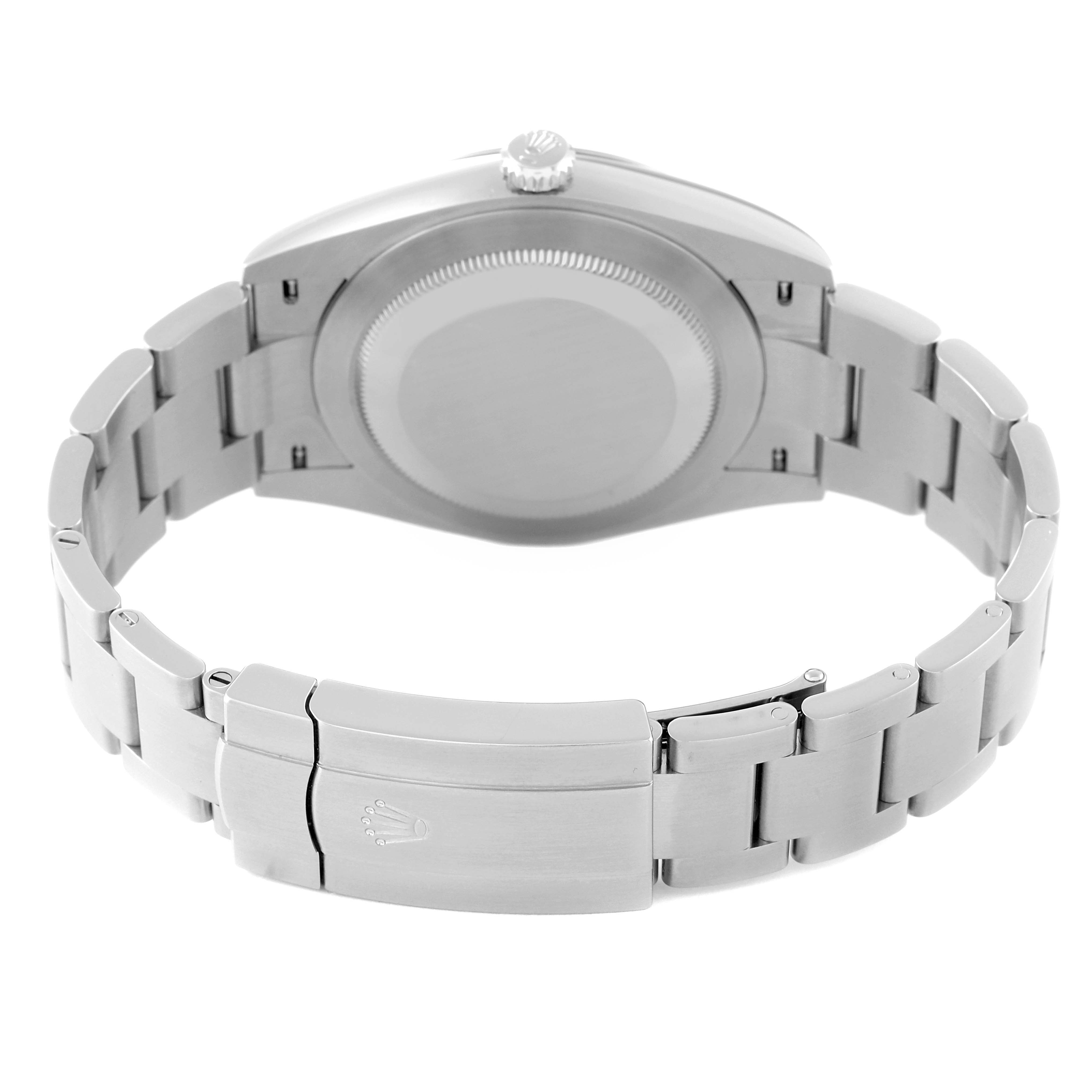 The image shows the backside and bracelet of a Rolex Oyster Perpetual 124300 Men
s Stainless Steel Blue Dial 124300 Men
s Stainless Steel Blue Dial watch from a rear view angle.