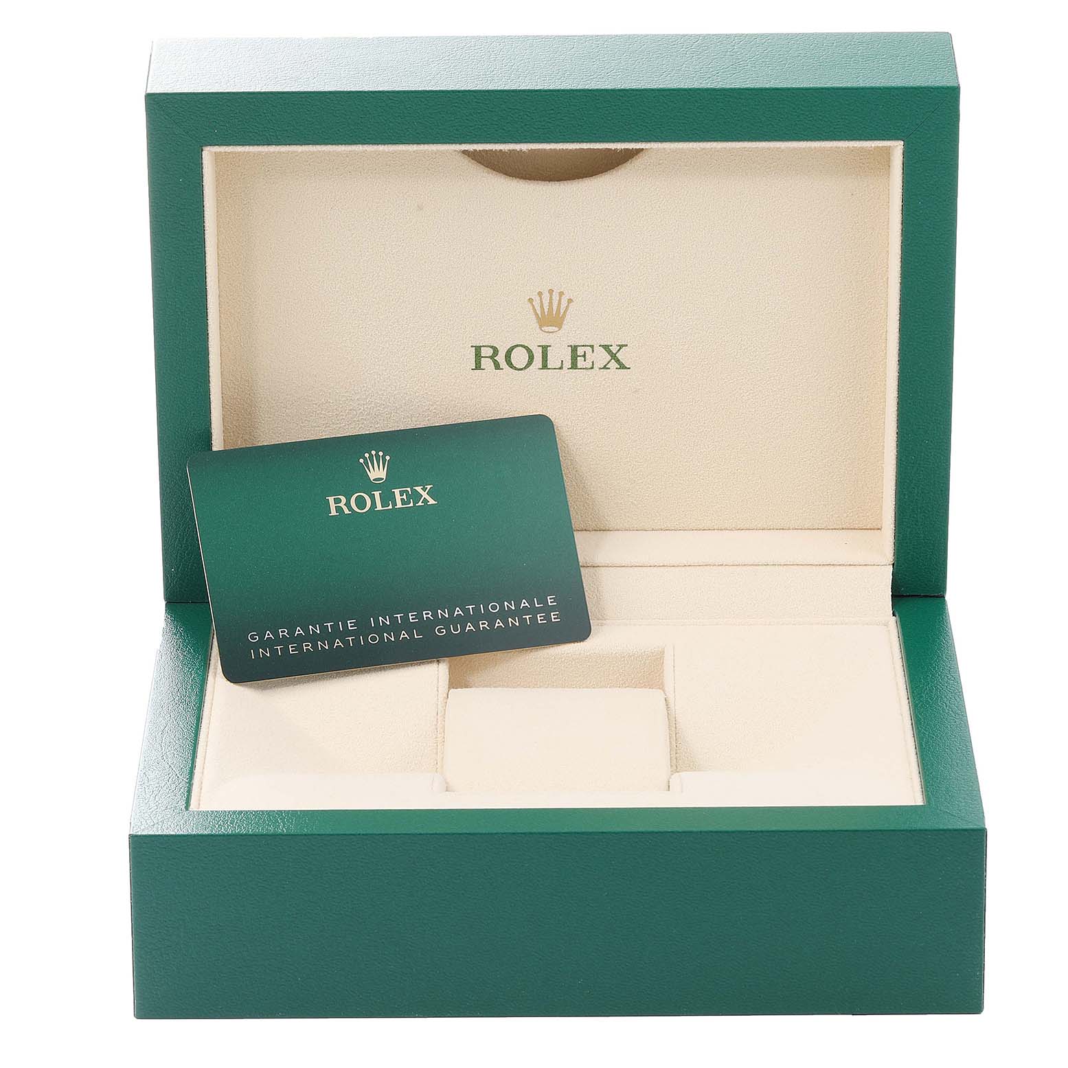 The image shows an open Rolex box for the Oyster Perpetual model, including an international guarantee card.