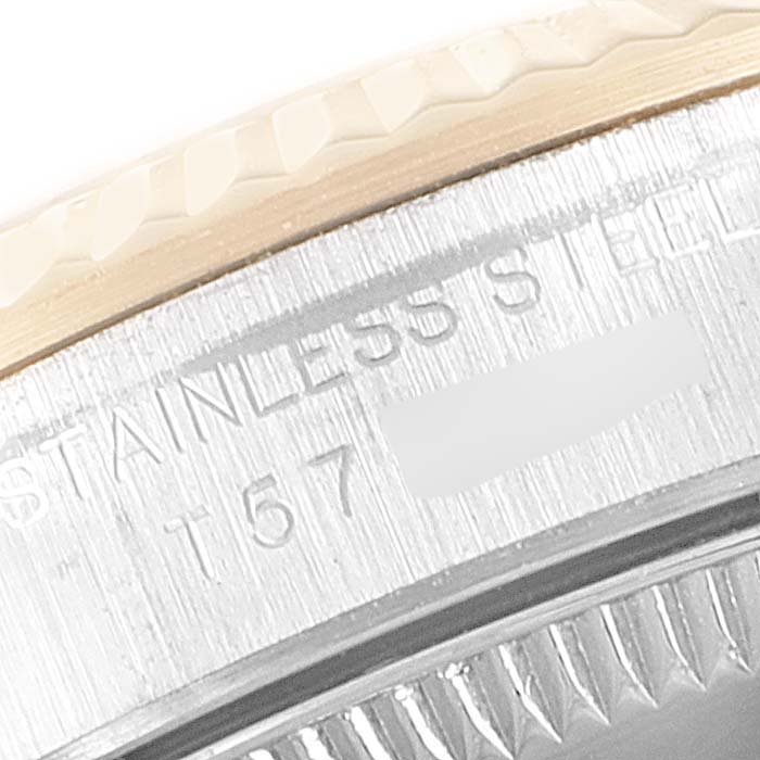 The image shows a close-up of the bezel and the engraved text on the side of a Rolex Oyster Perpetual 67193 Women's Steel and Gold (two tone) Champagne Dial 67193 Women's Steel and Gold (two tone) Champagne Dial watch case.