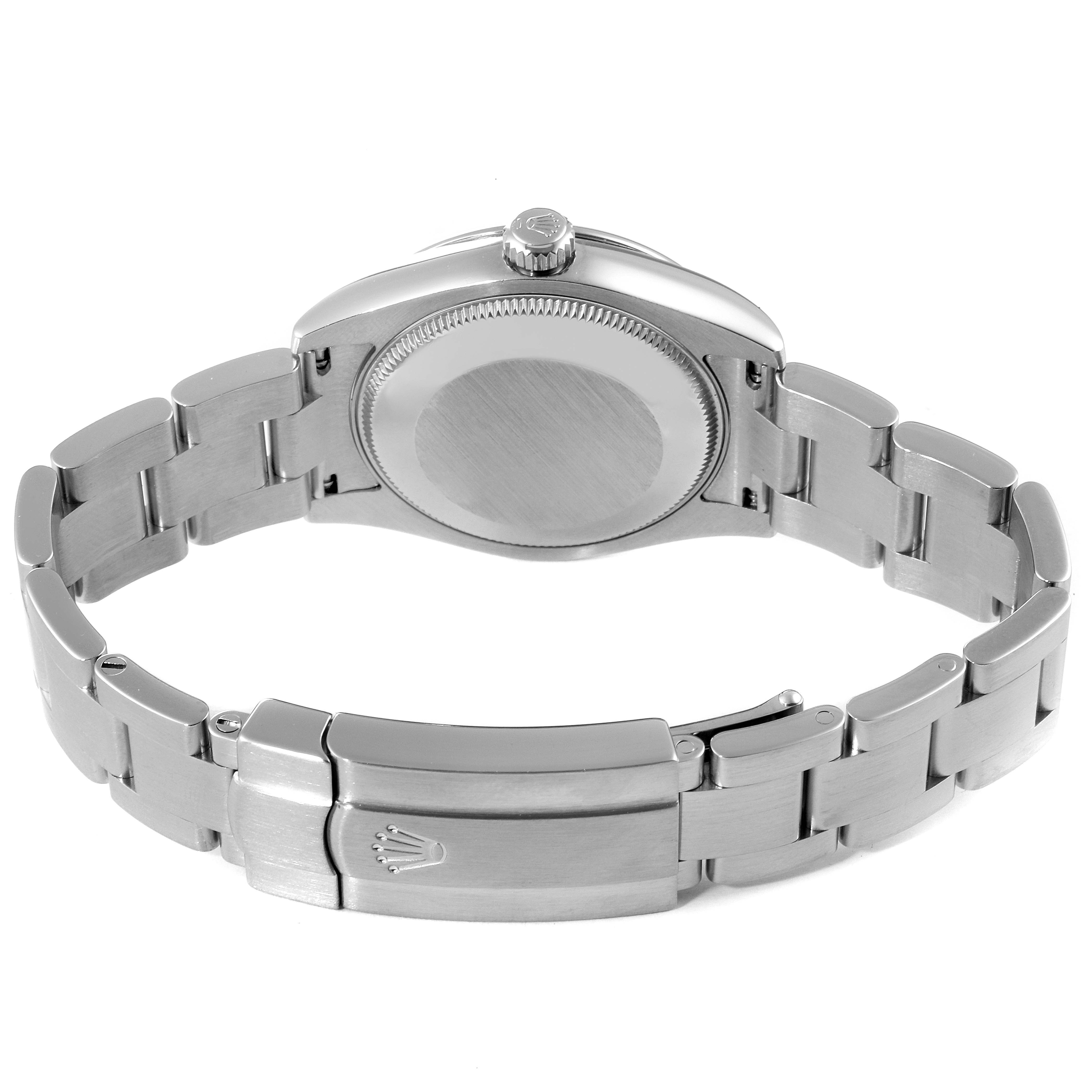 The image shows the back case and bracelet clasp of a Mid-Size Rolex watch.