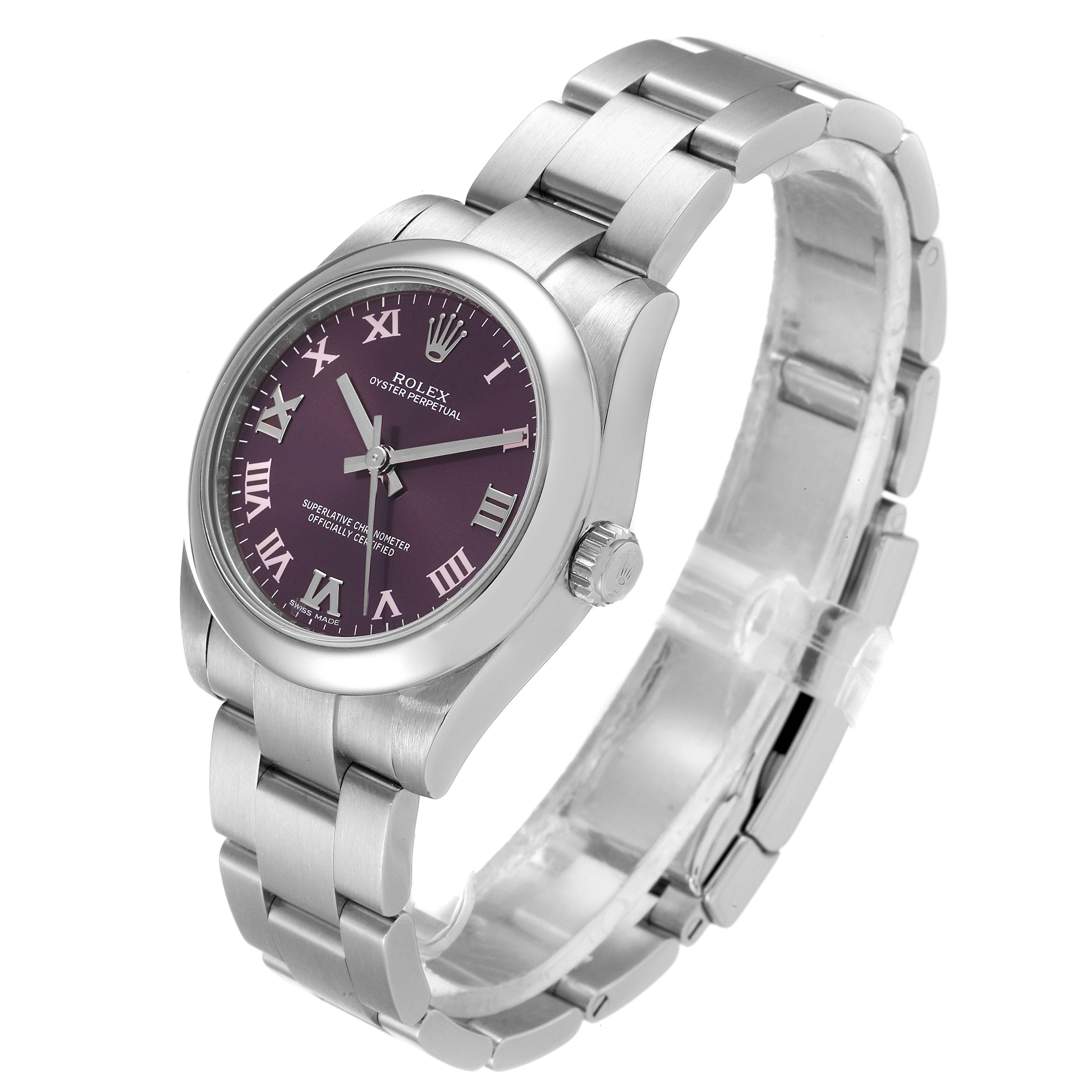 This angled view of the Rolex Mid-Size 177200 Women's Stainless Steel Burgundy Dial 177200 Women's Stainless Steel Burgundy Dial Oyster Perpetual watch showcases the dial, bracelet, and crown.