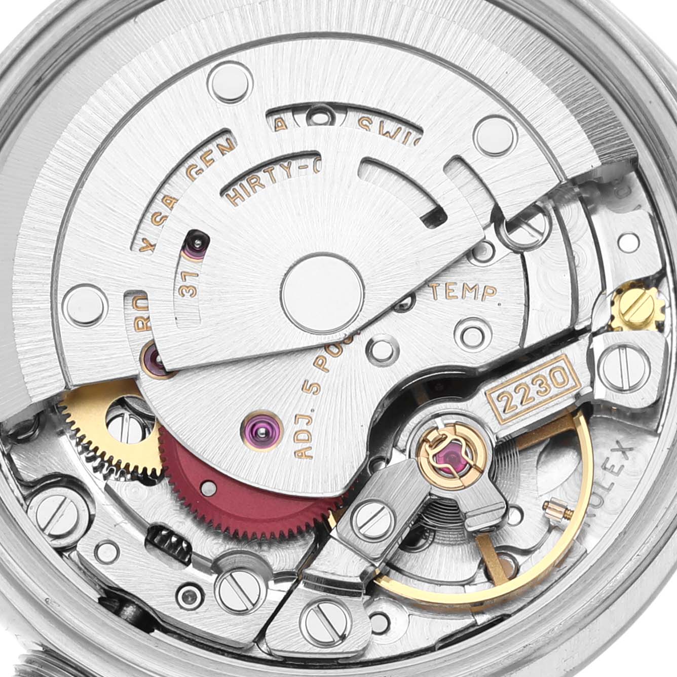 This image shows the inner mechanical movement of a Rolex Oyster Perpetual 76080 Women's Stainless Steel Silver Dial 76080 Women's Stainless Steel Silver Dial watch, viewed from a close-up angle.