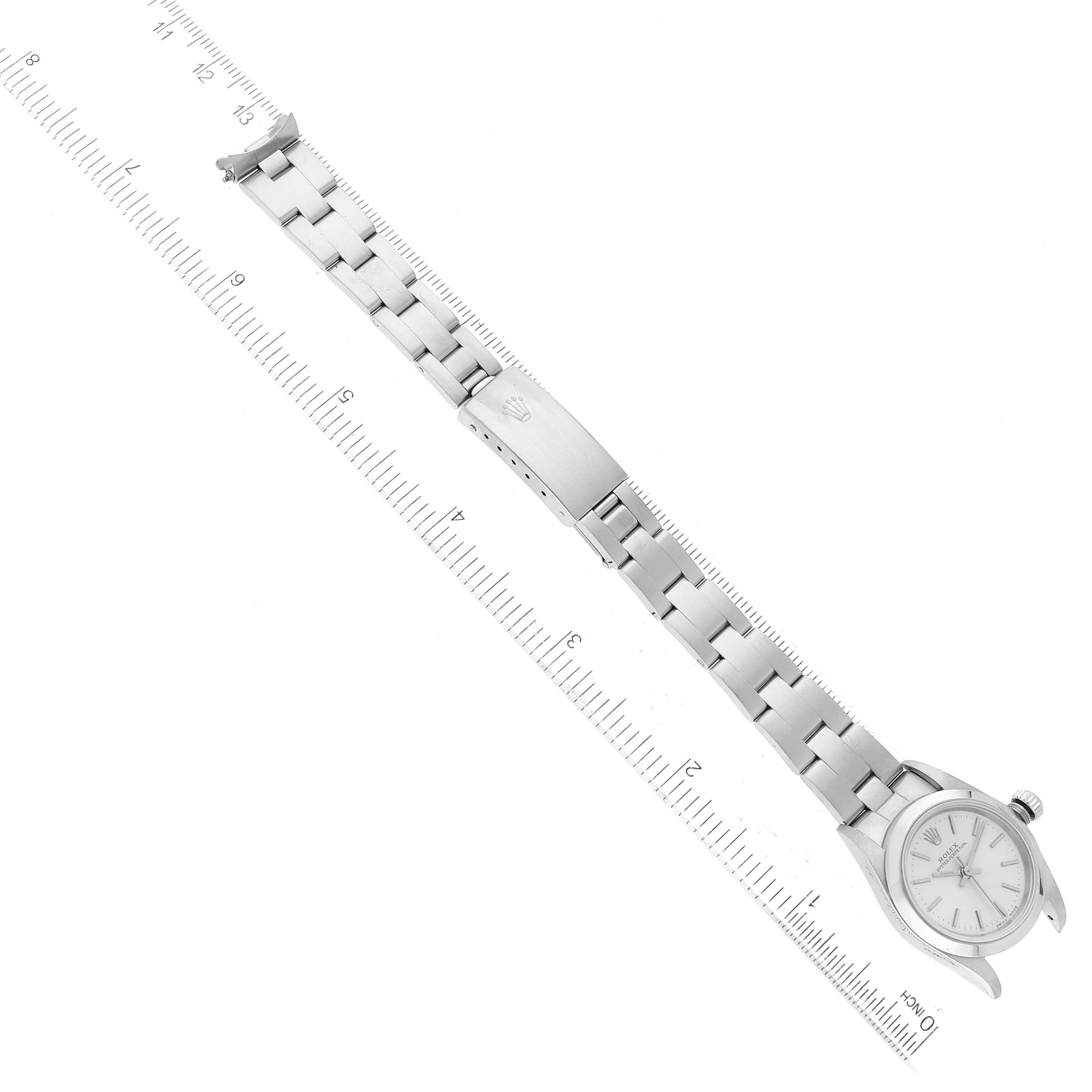 This image shows an overhead view of the Rolex Oyster Perpetual 76080 Women's Stainless Steel Silver Dial 76080 Women's Stainless Steel Silver Dial watch, focusing on the bracelet and clasp.