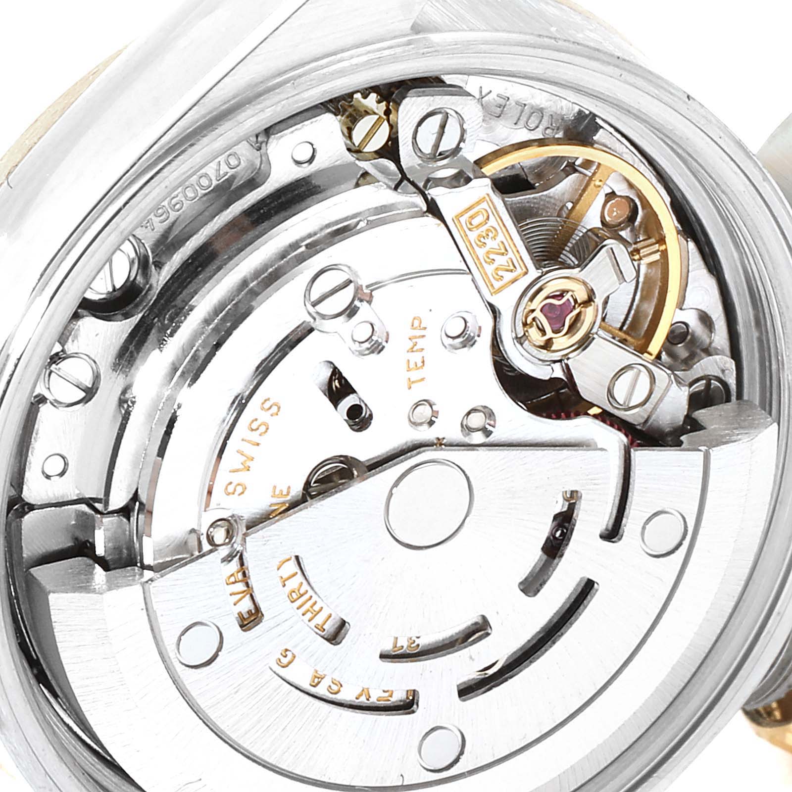 This image shows a close-up view of the internal mechanical movement of the Rolex Oyster Perpetual 76193 Women's Steel and Gold (two tone) Silver Dial 76193 Women's Steel and Gold (two tone) Silver Dial watch.