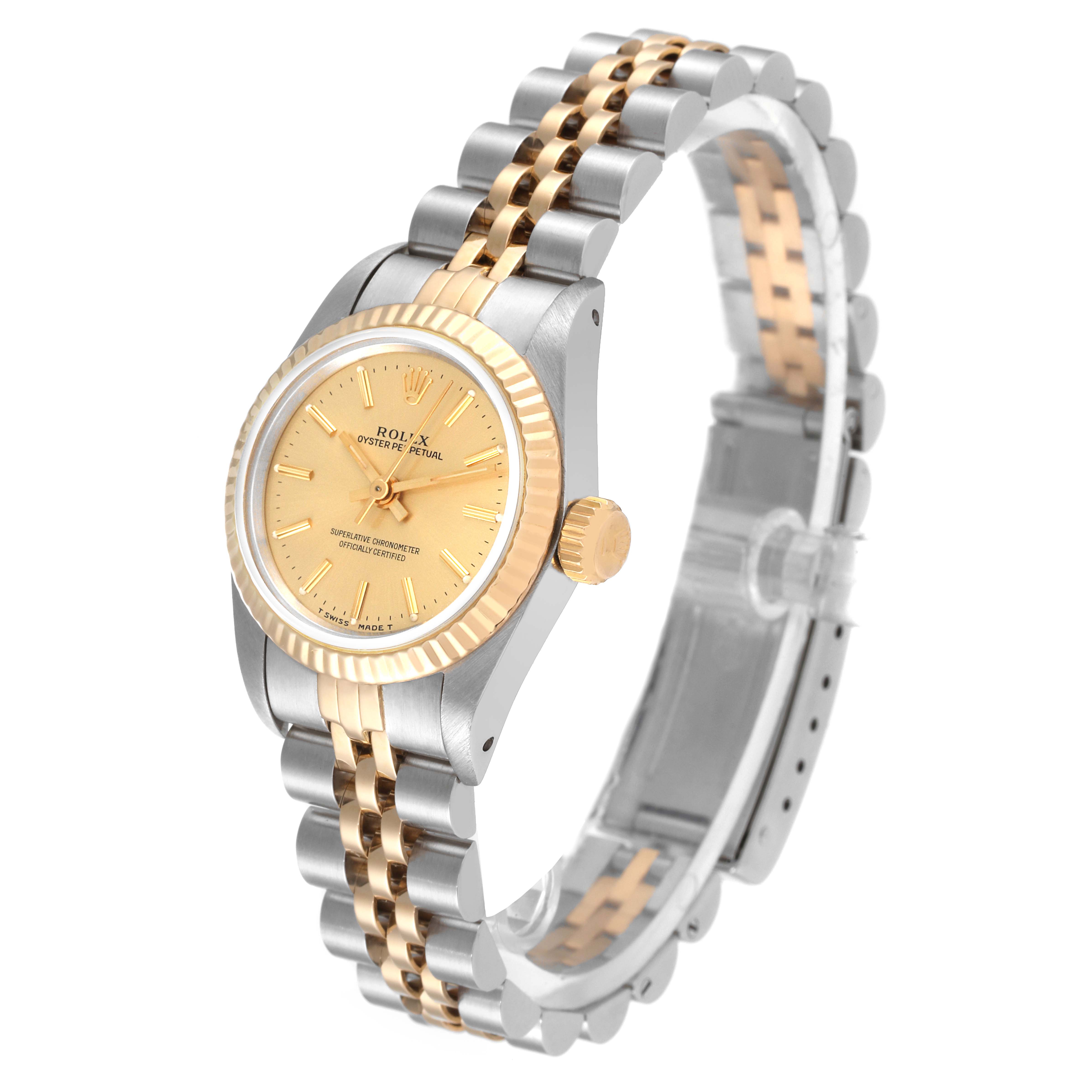 The Rolex Oyster Perpetual 67193 Women's Steel and Gold (two tone) Champagne Dial 67193 Women's Steel and Gold (two tone) Champagne Dial watch is shown at a slight angle, displaying the face, bezel, crown, and two-tone bracelet.