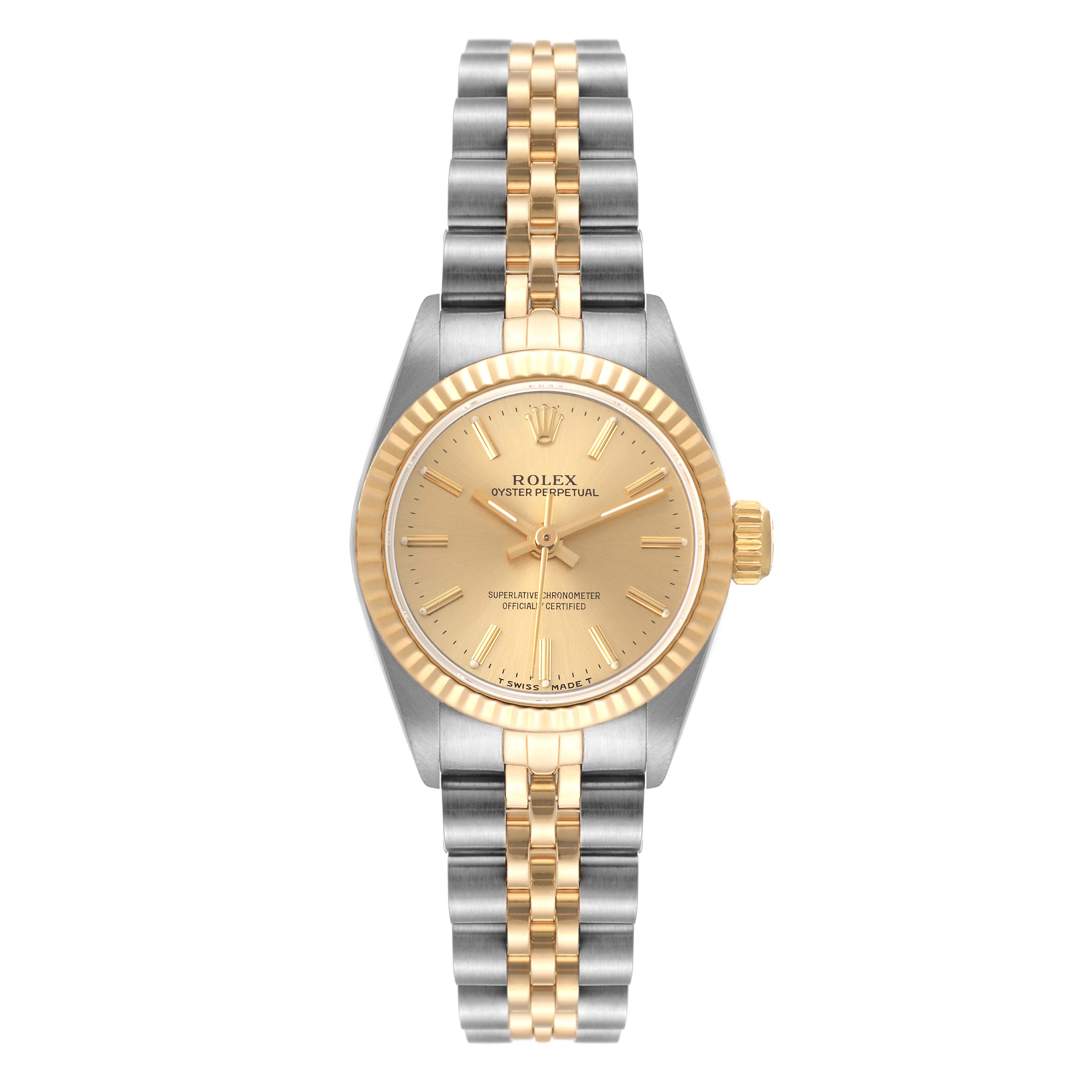 The Rolex Oyster Perpetual 67193 Women's Steel and Gold (two tone) Champagne Dial 67193 Women's Steel and Gold (two tone) Champagne Dial watch is shown from a front angle, displaying its gold and silver bracelet, dial, and fluted bezel.