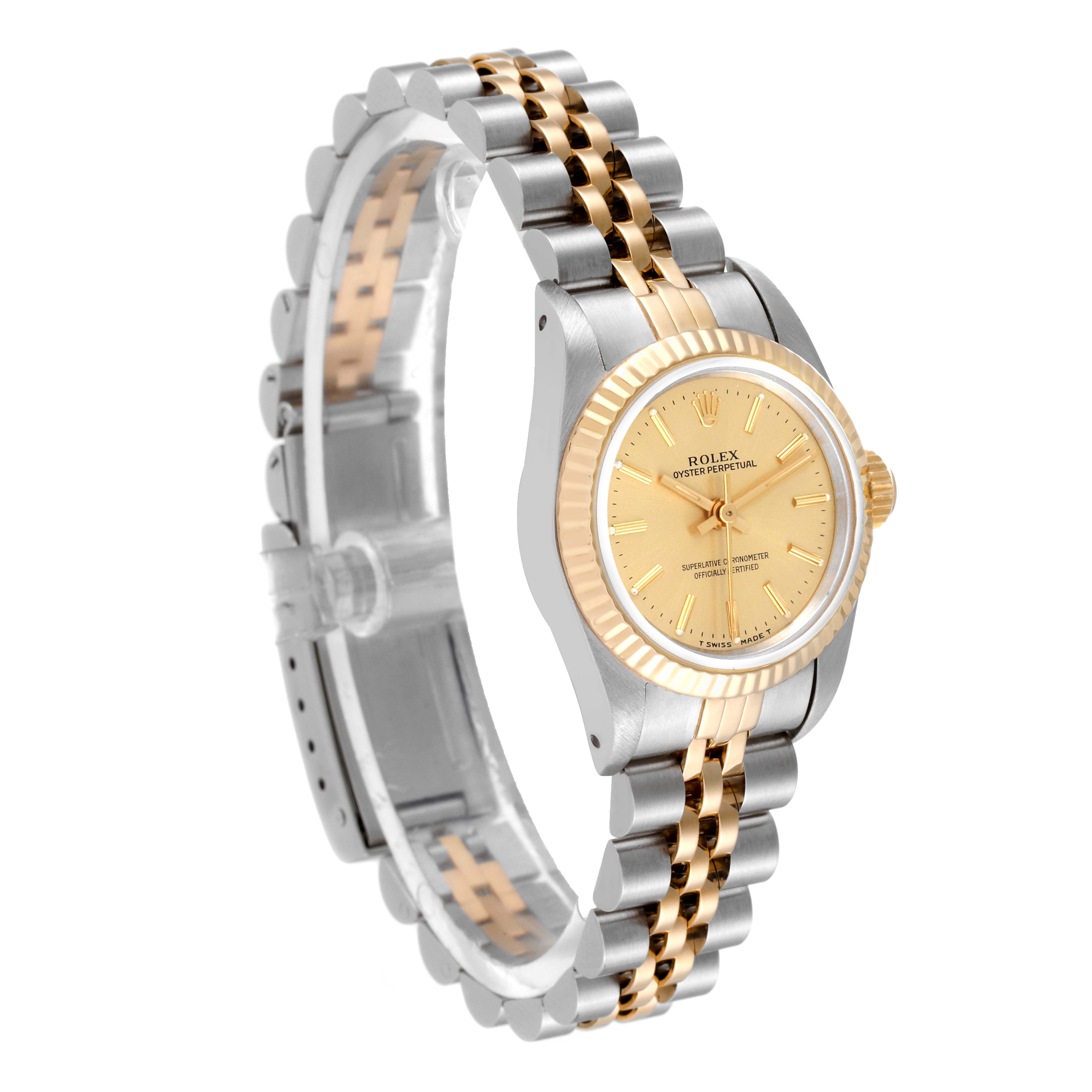 This Rolex Oyster Perpetual 67193 Women's Steel and Gold (two tone) Champagne Dial 67193 Women's Steel and Gold (two tone) Champagne Dial watch is shown at an angled side view, displaying the dial, case, and two-tone bracelet.