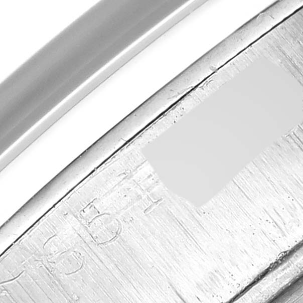 This close-up image shows part of the metal bracelet of the Vintage Collection model by Rolex.