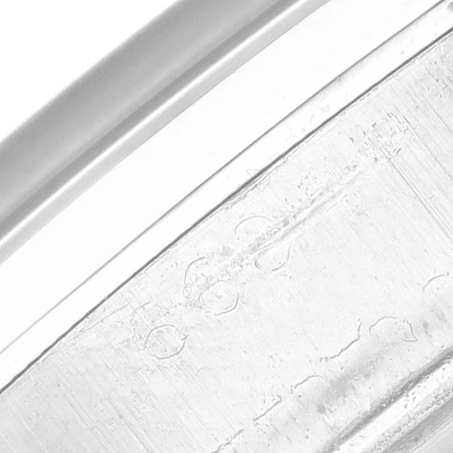 The image shows a close-up angle, emphasizing the serial or model number area on the case of the Rolex Vintage Collection 6694 Men's Stainless Steel Black Dial 6694 Men's Stainless Steel Black Dial watch.