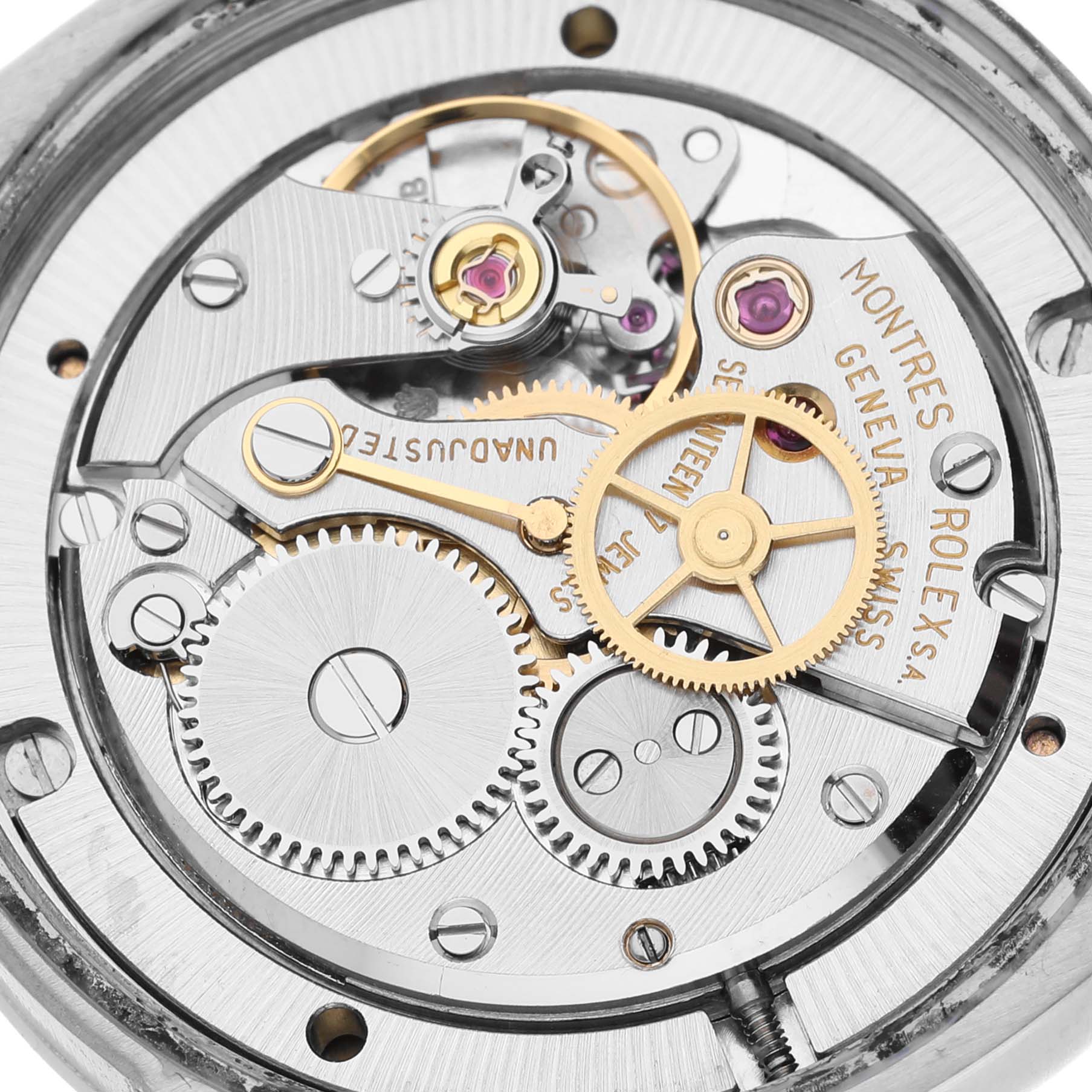 This image shows the intricate internal mechanism of the Rolex Vintage Collection 6694 Men's Stainless Steel Black Dial 6694 Men's Stainless Steel Black Dial watch, focusing on gears and components up close.